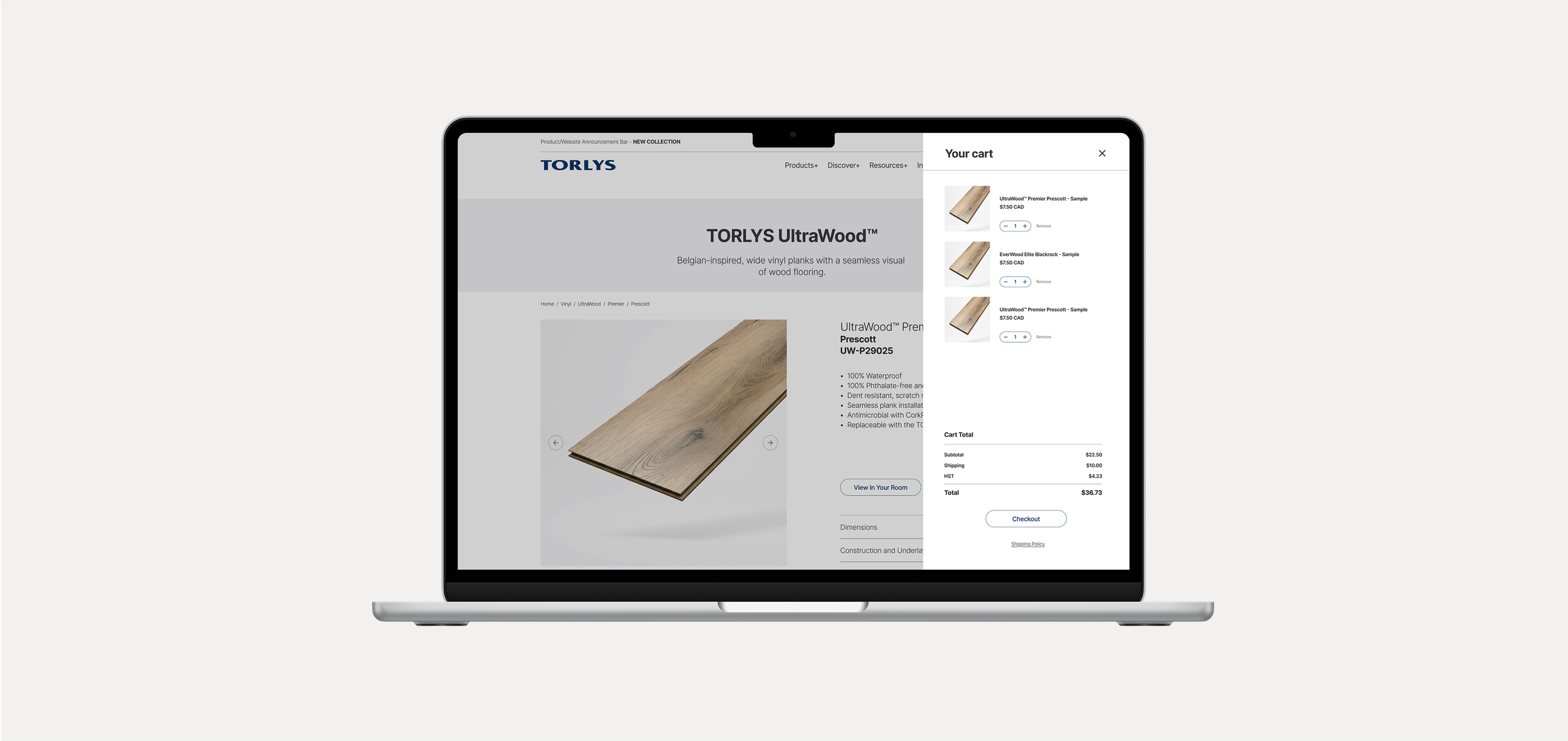 Laptop displaying a flooring product website and an online shopping cart with three flooring sample items and order details.