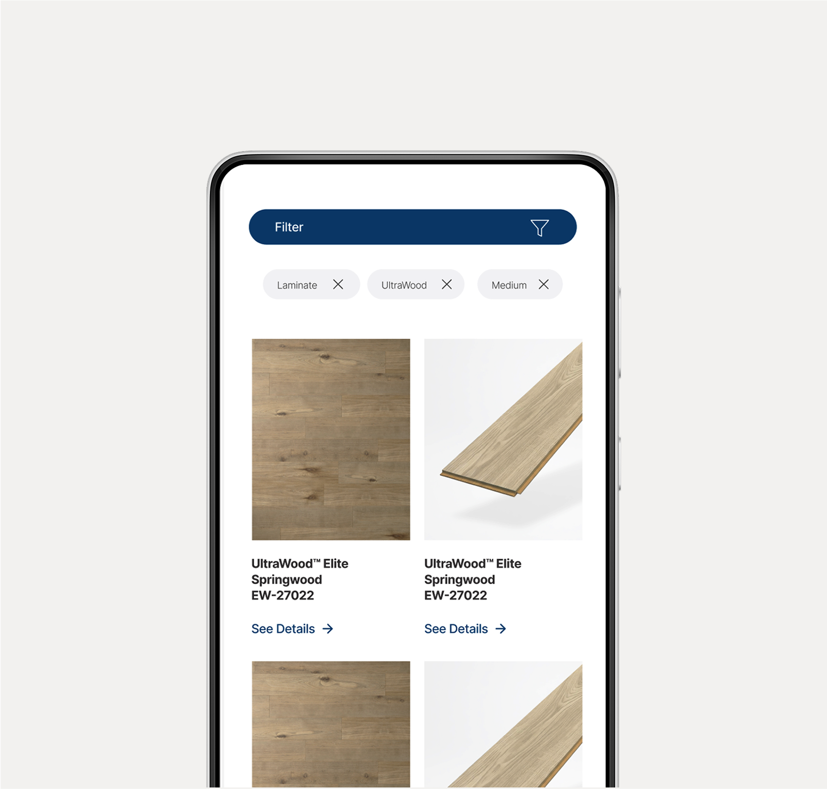 Mobile phone screen displaying a flooring selection app with filters for laminate, UltraWood, and medium. The screen shows images of wood flooring options labeled UltraWood Elite Springwood EW-27022, with options to see details.