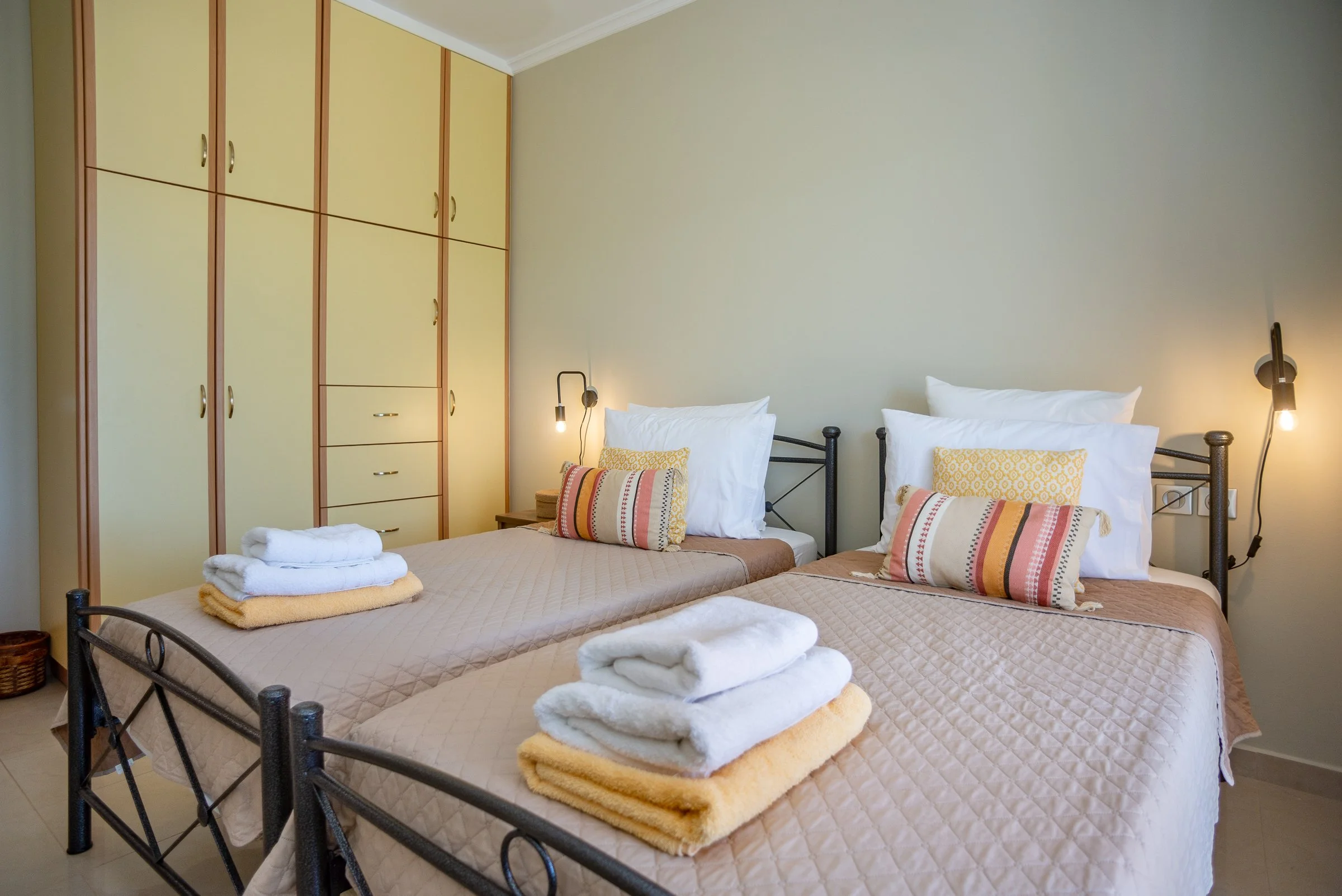 Filled with natural light and enjoying its own private balcony, this twin room looks towards Mount Ainos and the surrounding countryside.