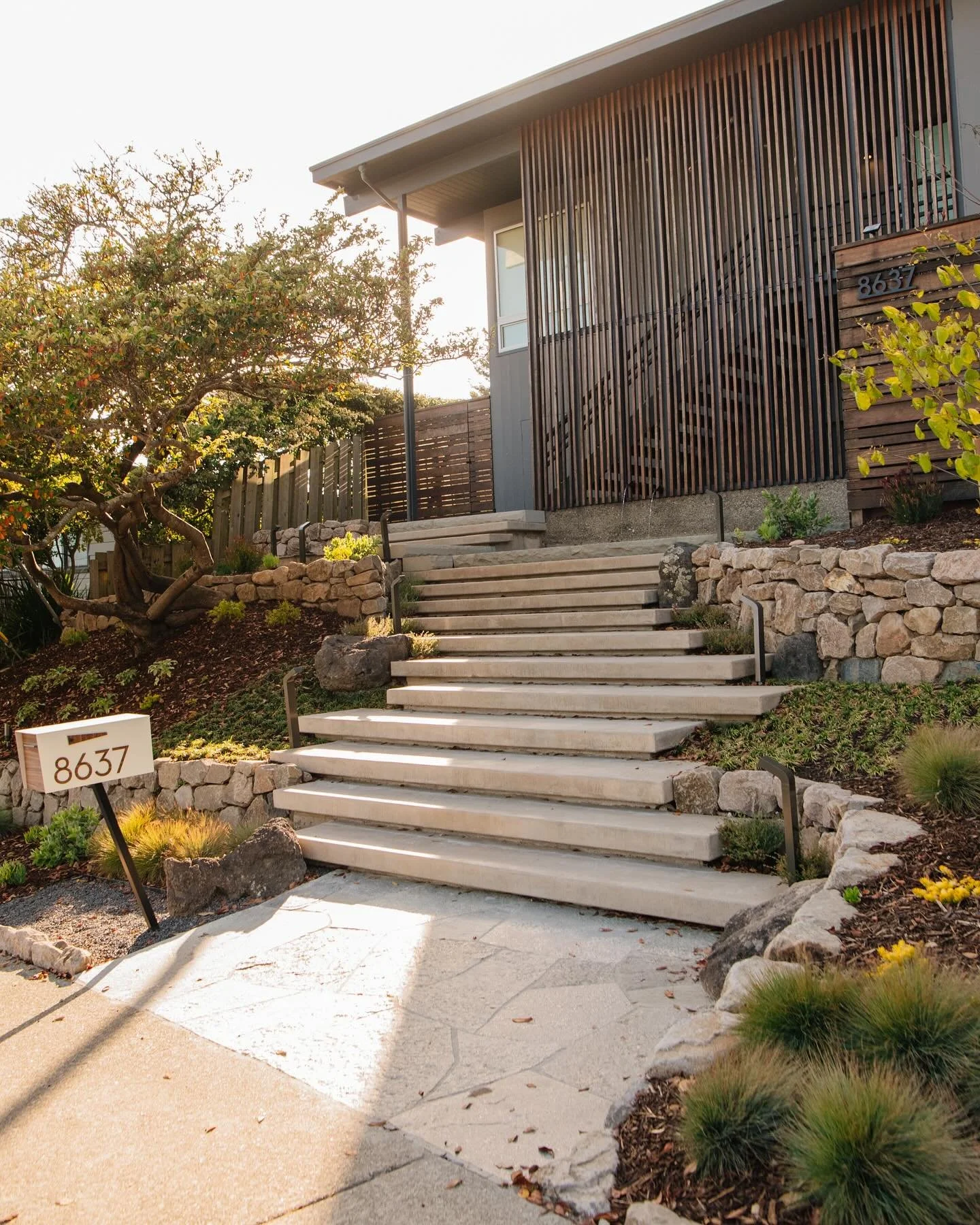 * 

When a front yard transforms into a haven, a spot for chats, a step or rock to relax on, a haven for pets to soak up the sun, a delight for neighbors, a playground for kids while you savor coffee by the soothing water feature. 

A space that spar