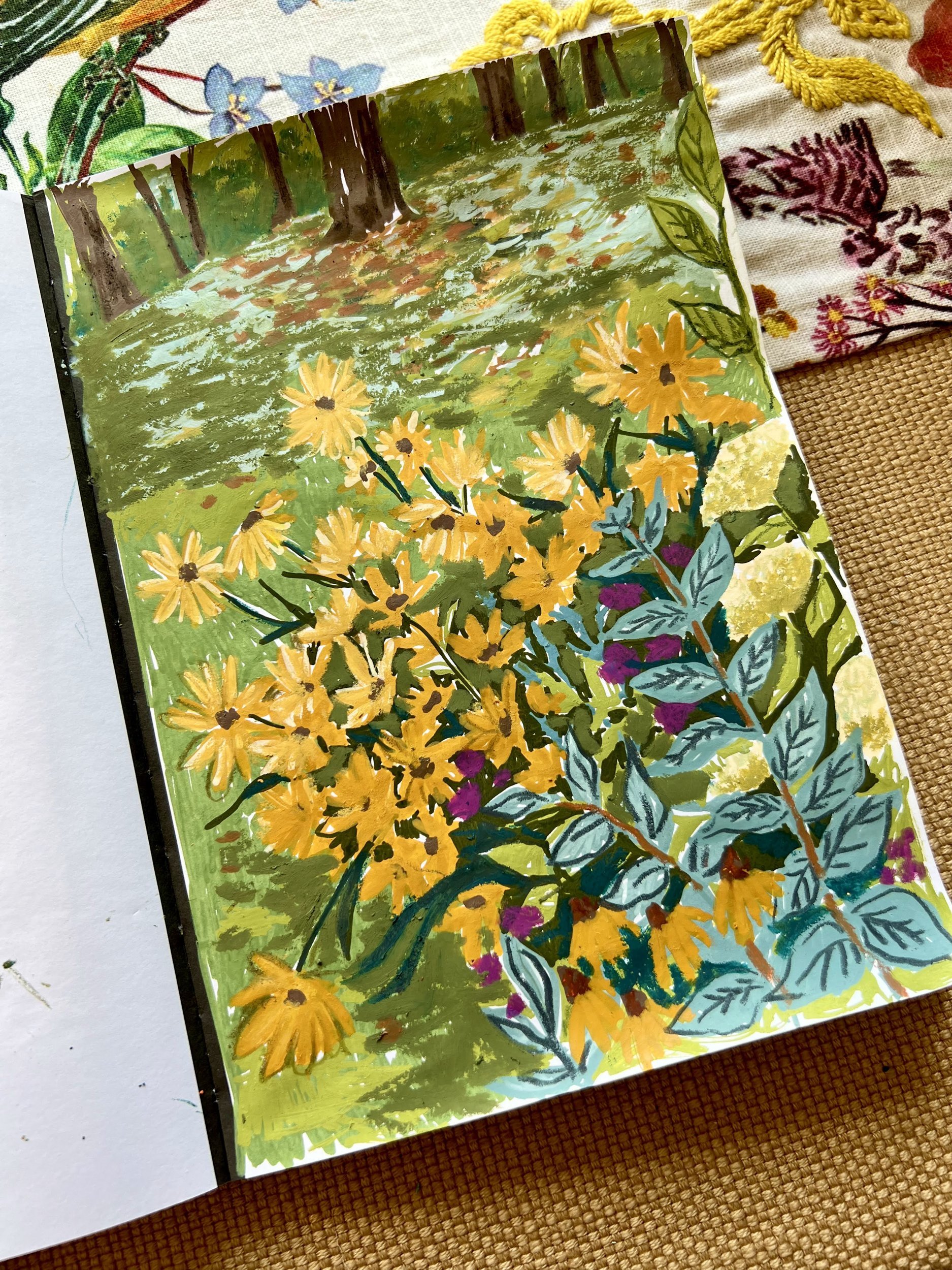 Sketchbook painting of yellow black-eyed Susans and blue-green leaves beneath trees