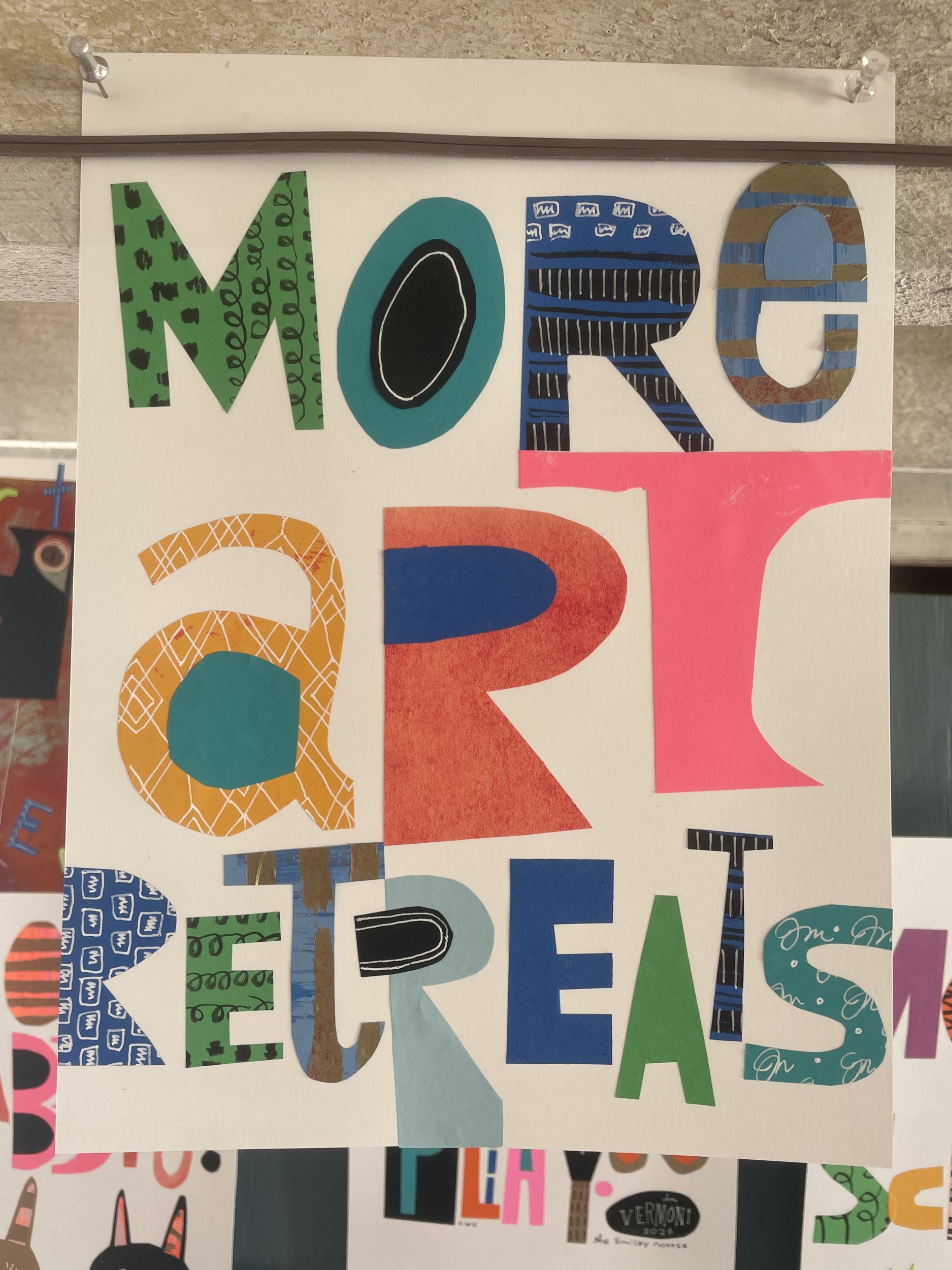 Patterned cut paper collage lettering that reads More Art Retreats in green, teal, orange and coral.