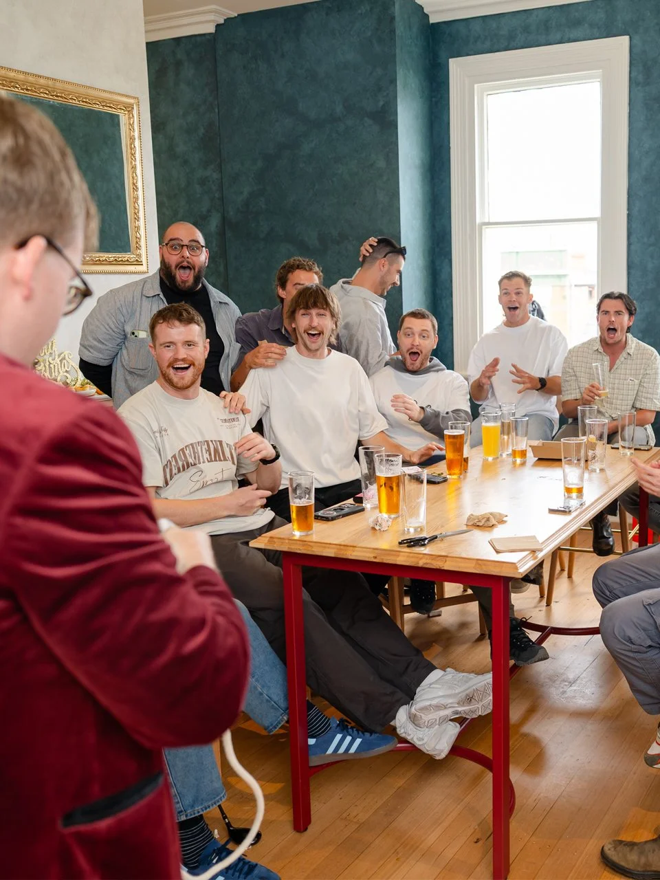 Josh Staley performing a feature magic show for an excited group of guests at a private Melbourne pub bucks party.
