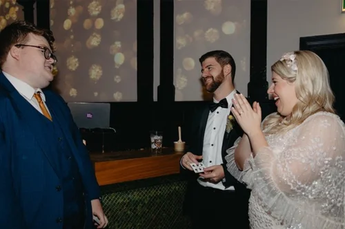 Wedding magician Melbourne - Josh Staley performing close-up magic for wedding guests