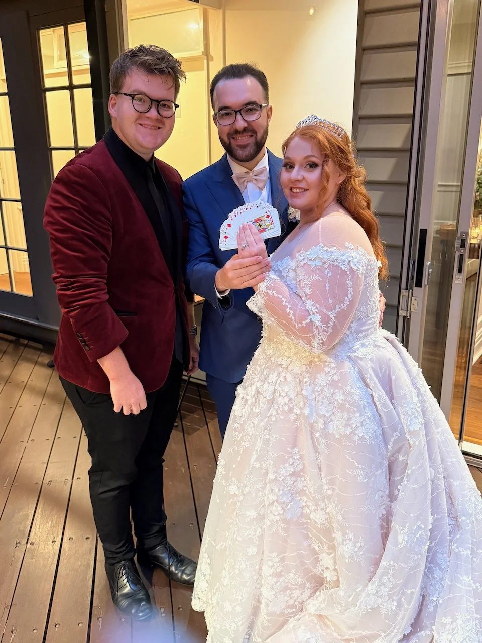 Australian Champion Magician Josh Staley performing close-up roving magic for a bride and groom at a Melbourne wedding reception.
