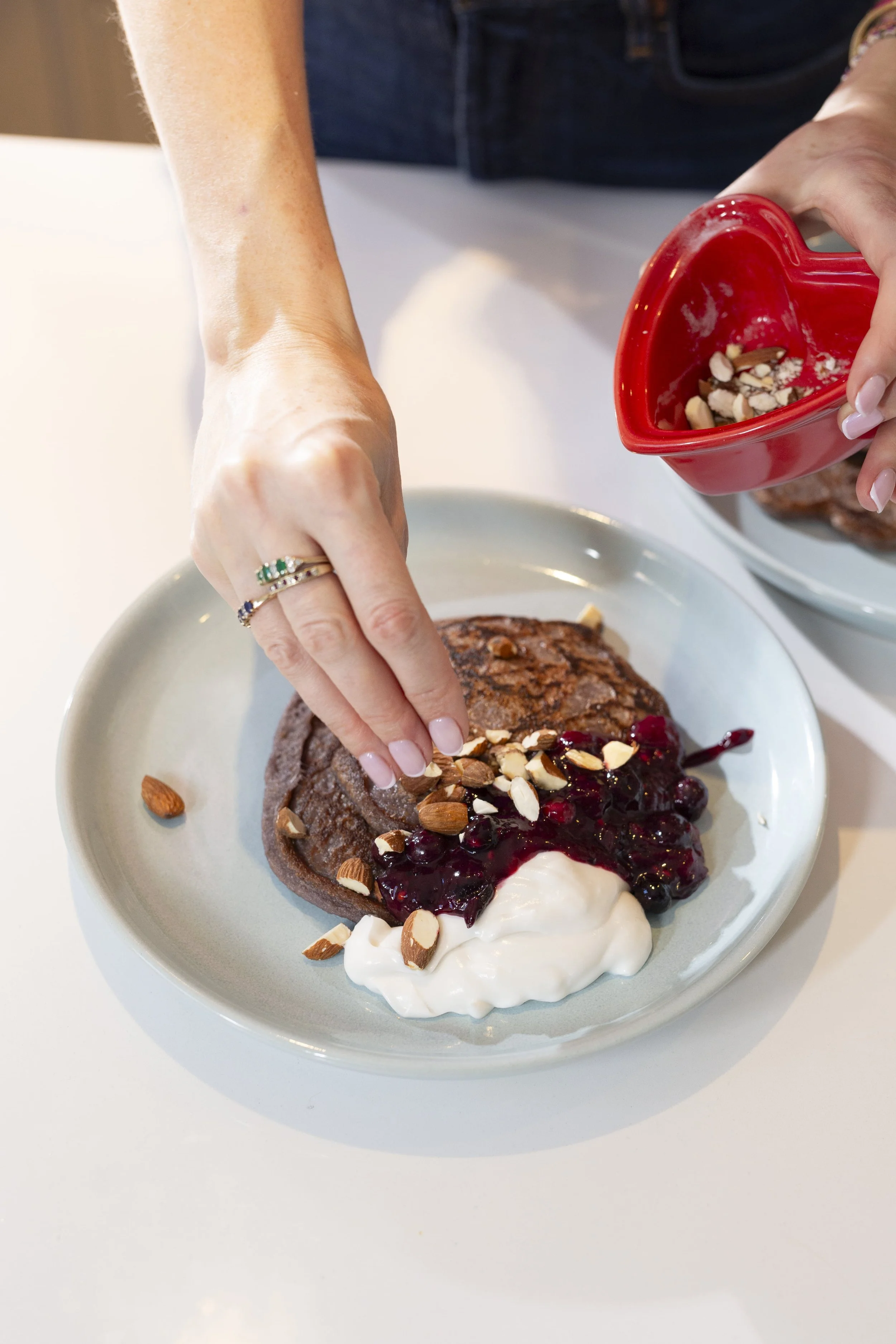 Coconut and Chia Pancakes with Coconut Yogurt and Berry Coulis