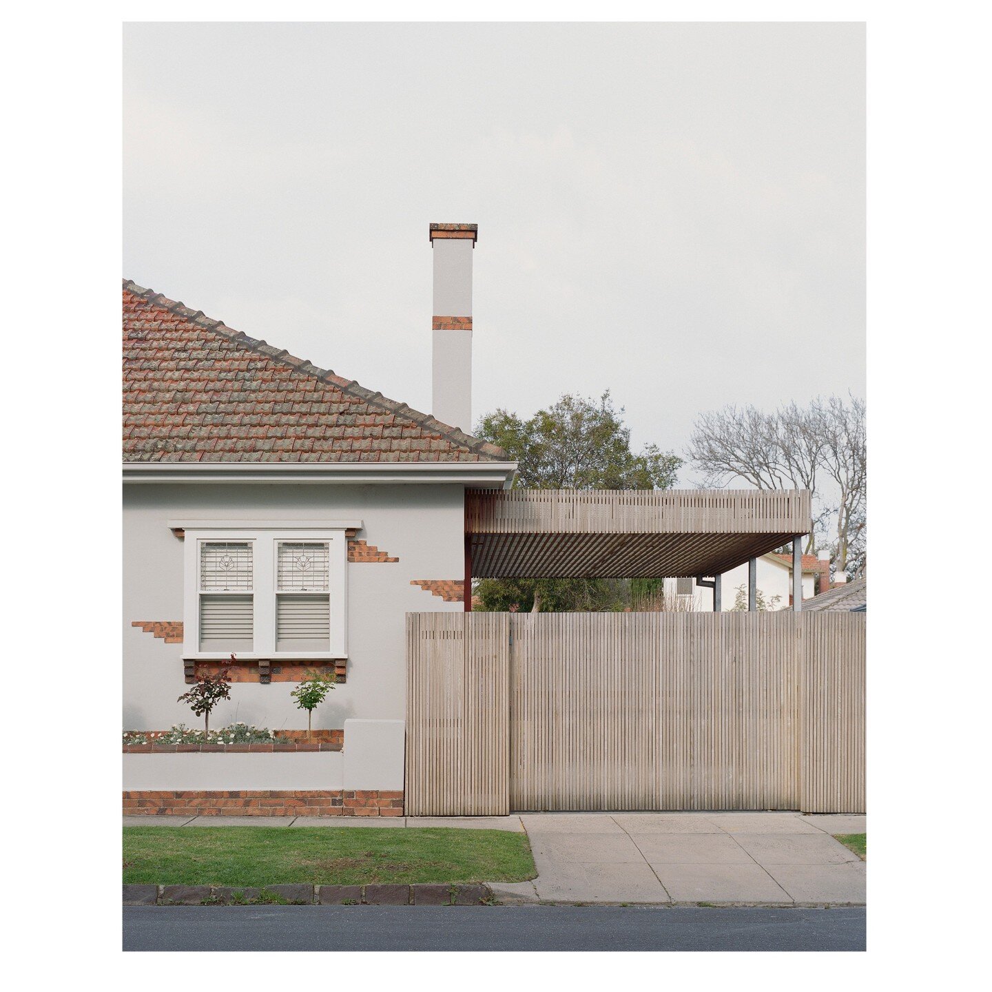 Gardenvale, from the street and from the rear garden . The front elevation's period detailing is restored, and flanked by a new batten fence + carport - a counterpoint to the solid brick house. The eastern wall onto the rear garden is completely rebu