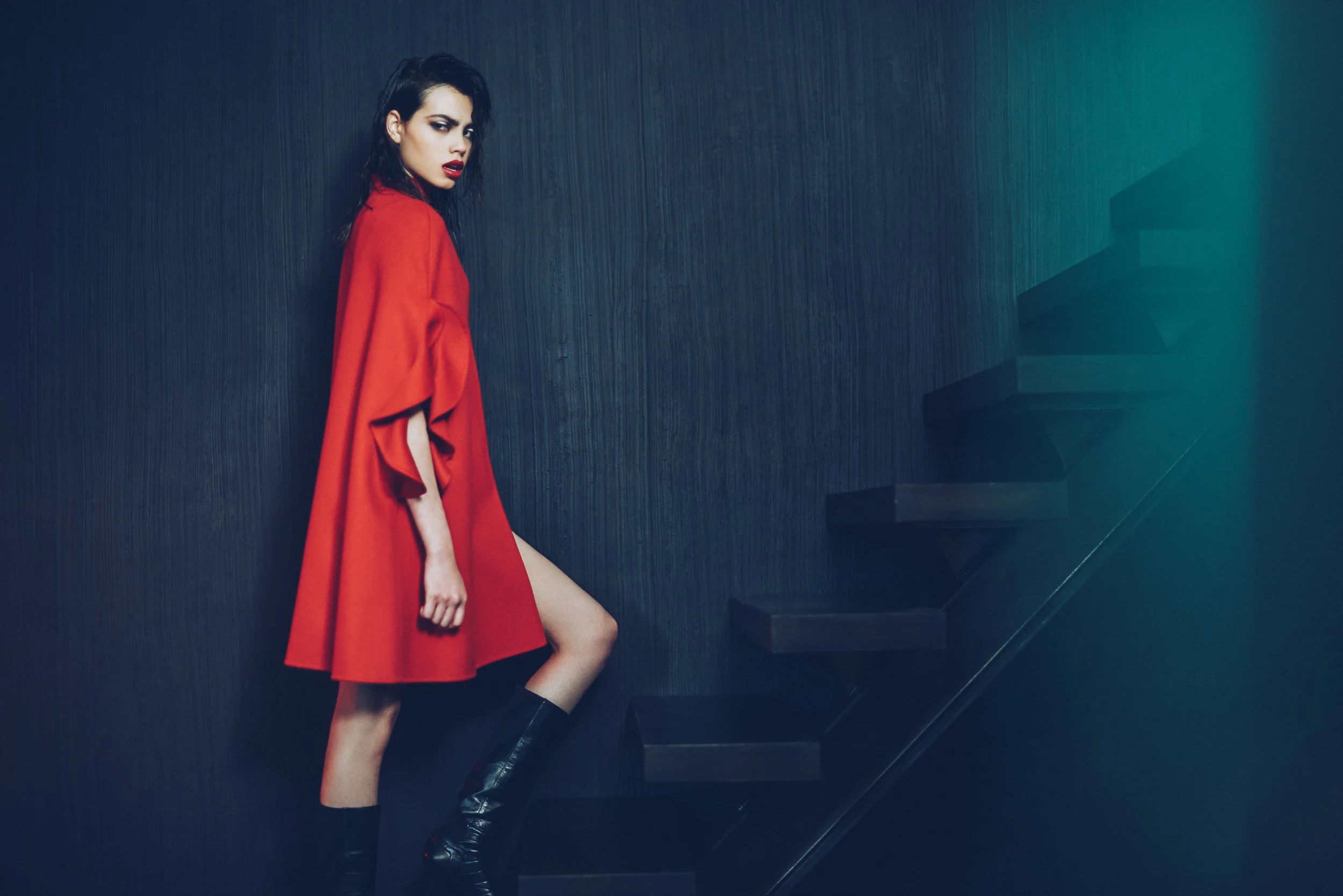 Fashion Editorial: Dramatic red statement coat with boots | Fashion Direction and Styling by Georgia Alexia Benjou