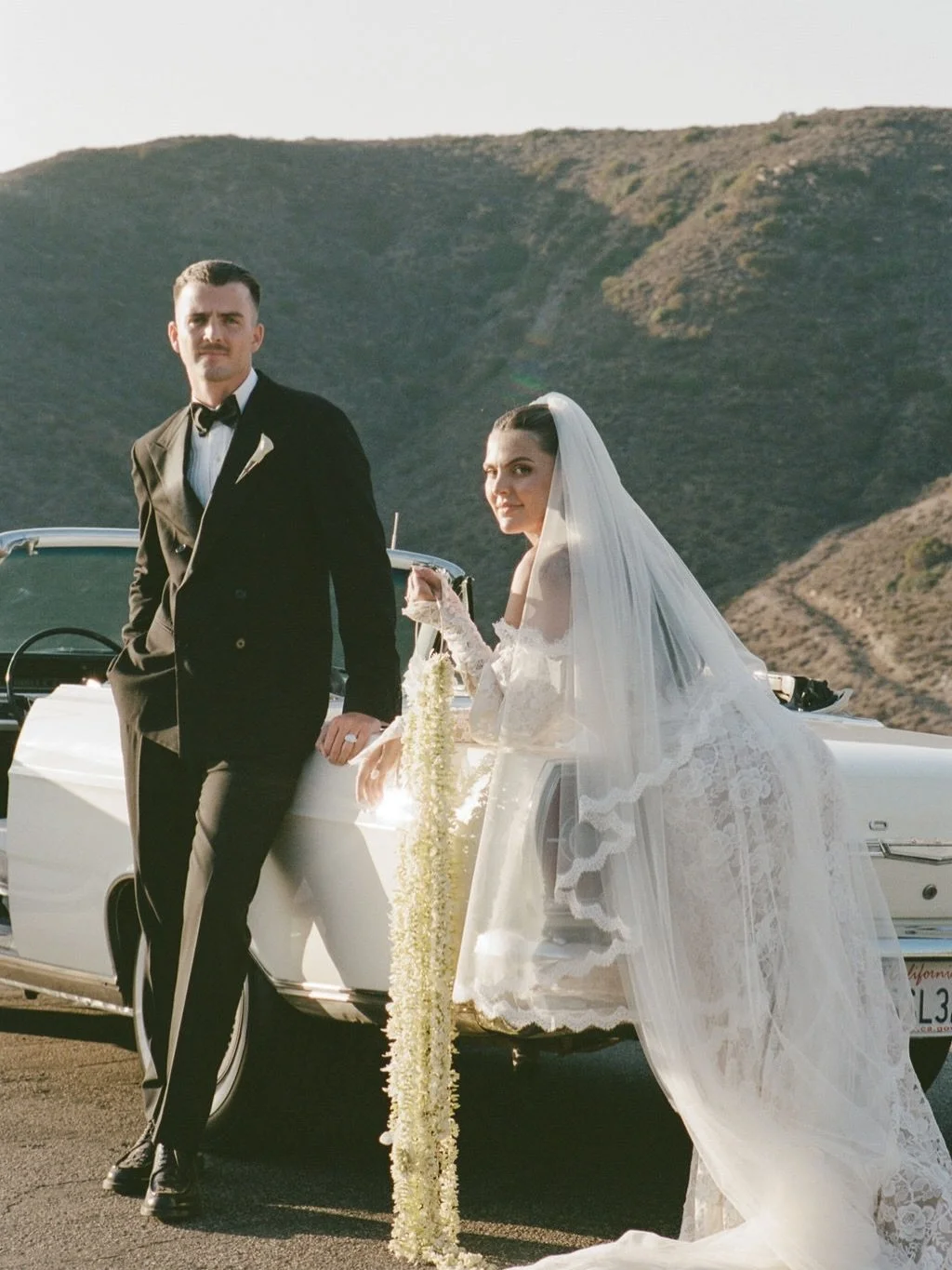 During their venue walkthrough, Dougie shared that his dream boutonniere was a single calla lily and trusted me to bring a creative twist. Inspired by their love for silver accents, I surprised him with a vintage brooch, a subtle detail I personally 