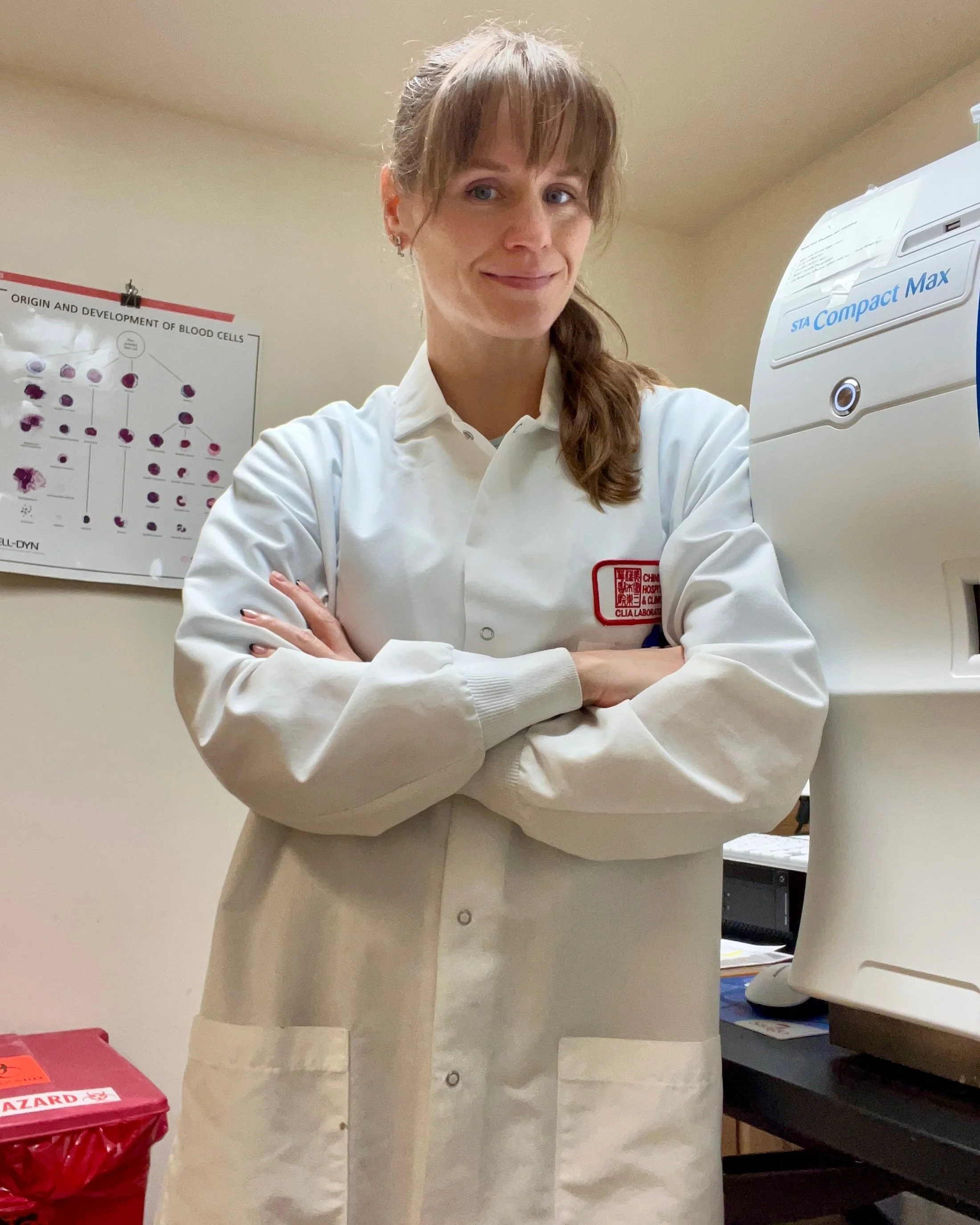 Natalie Renier-Bertolucci working at her employer's lab as a Clinical Laboratory Scientist 