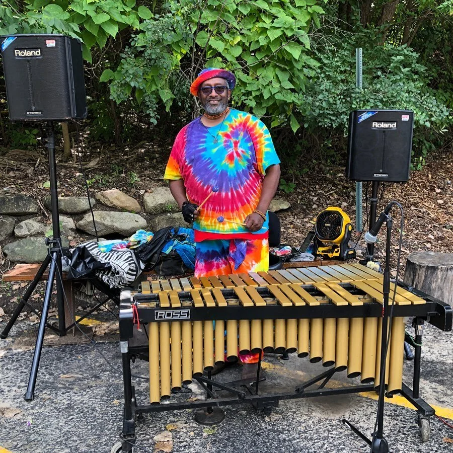 Busking at The Franklin Cider Mill in my ninja outfit.