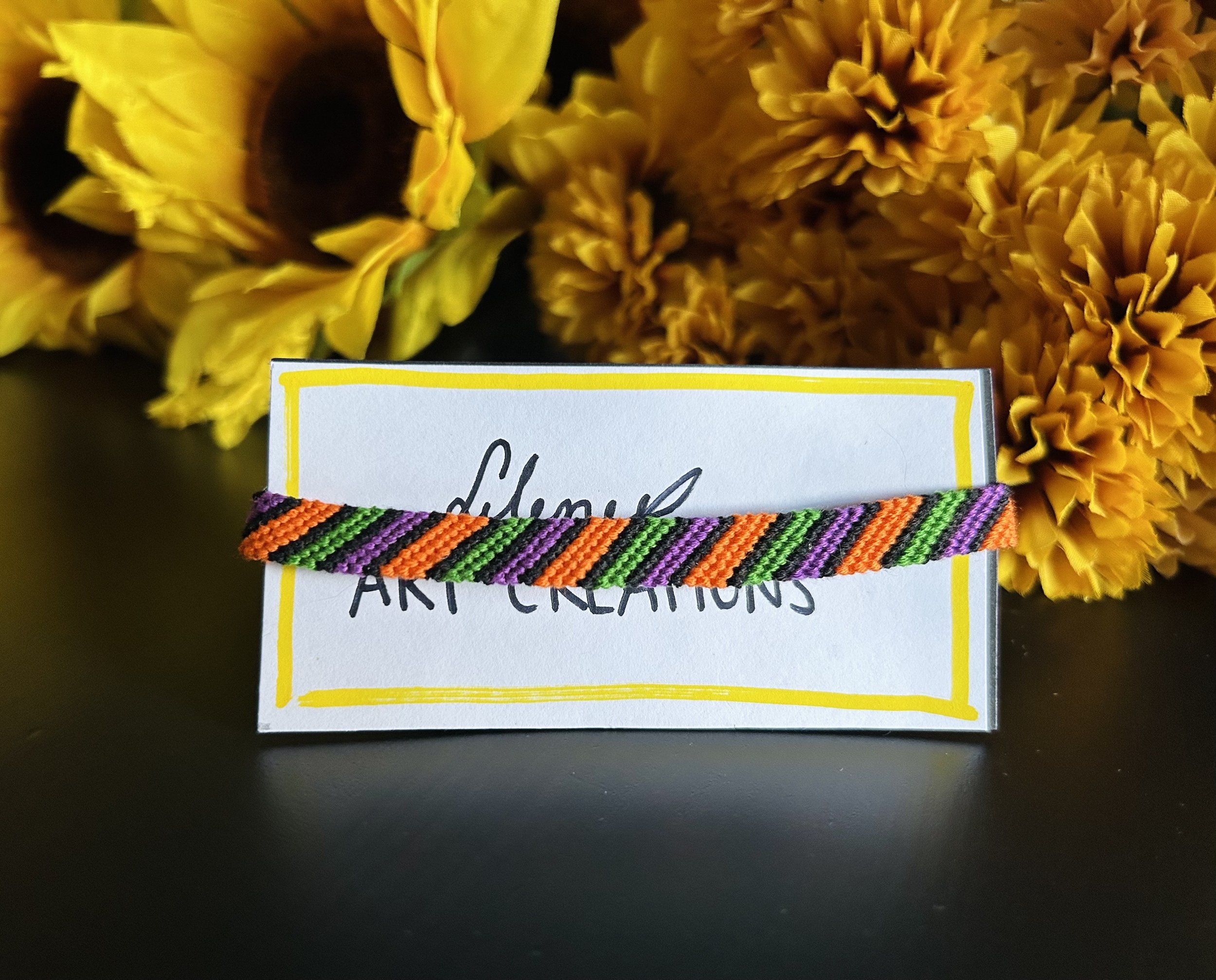 Blank, Green, Purple, and Orange Bracelet