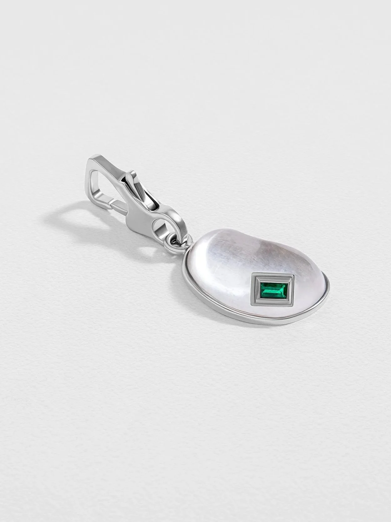 The Sculpted Pendant with Baguette Emerald