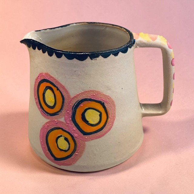 Melkkannetje roze oranje geel.jpg
