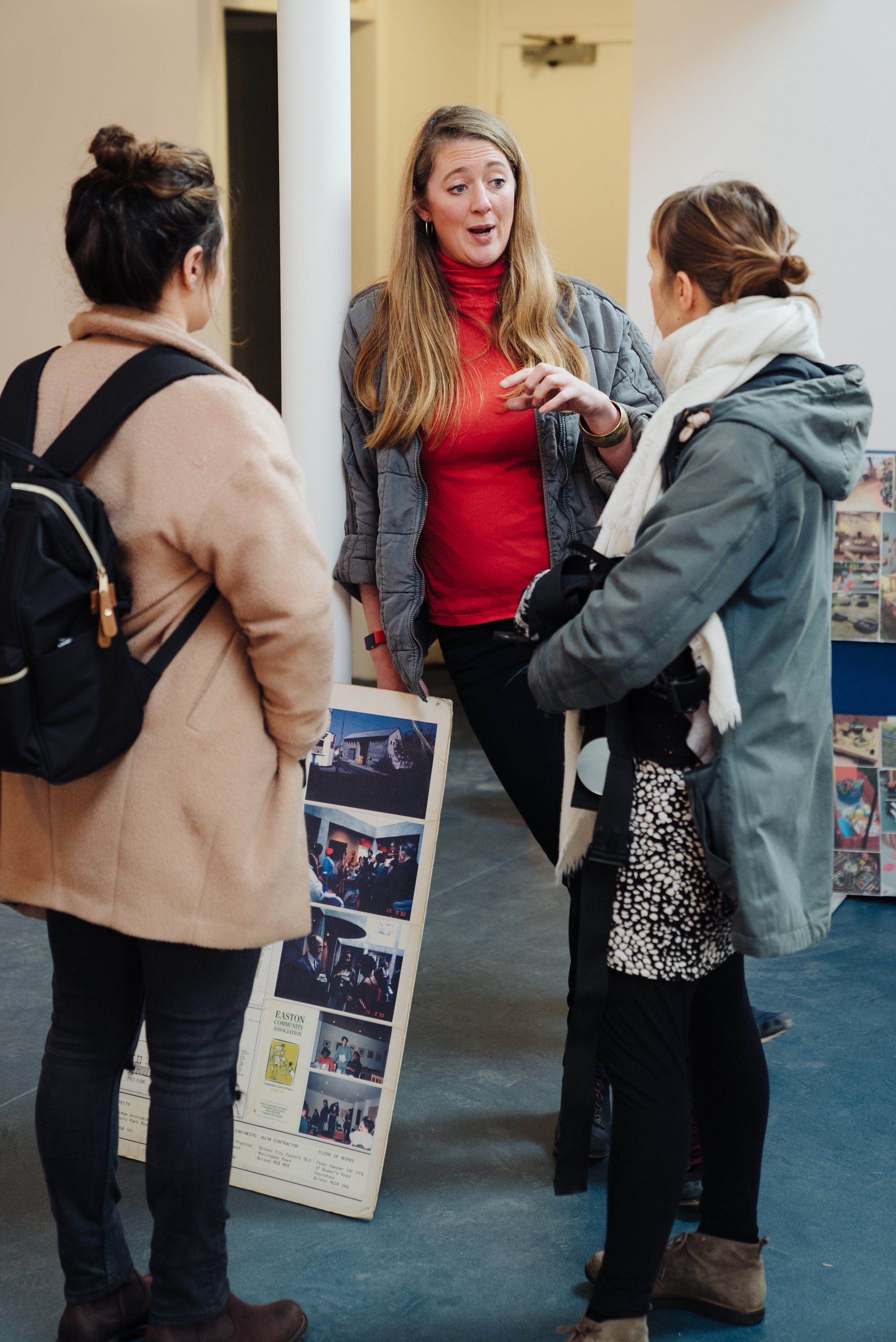 Sasha chatting to parents at open day