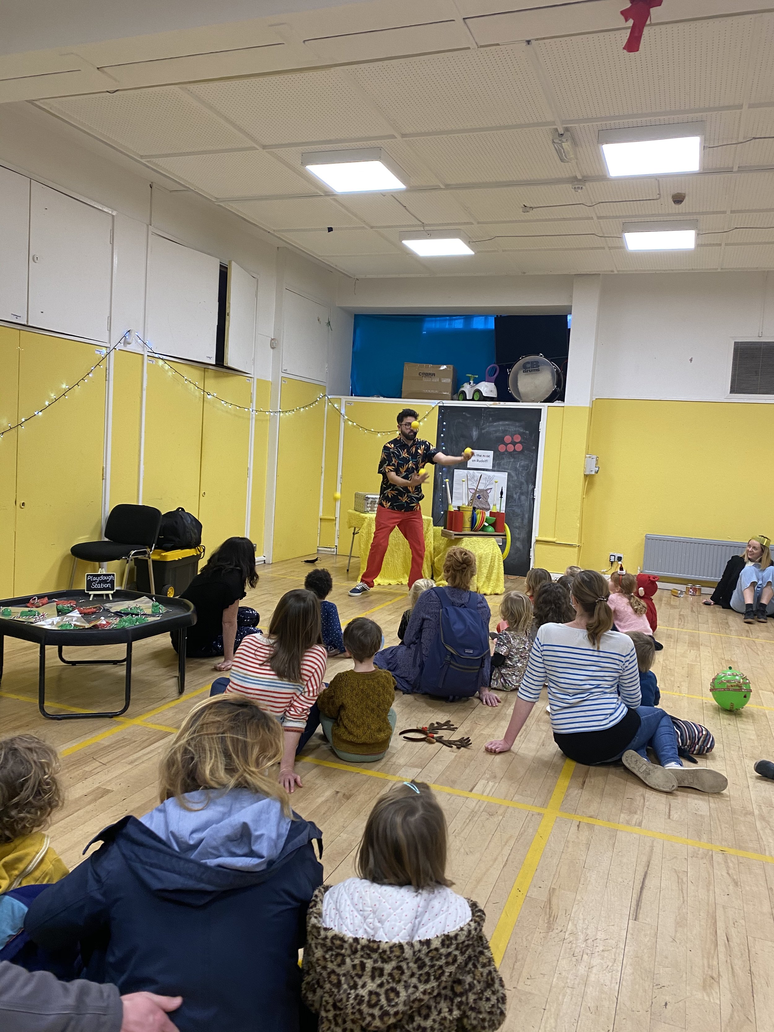 Entertaining the children at one of our Family Club events in the hall at Easton