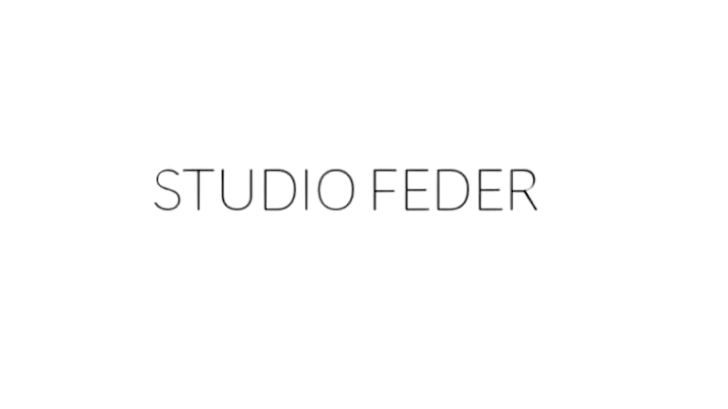 Tekst på et billede, hvor der står 'STUDIO FODER'.