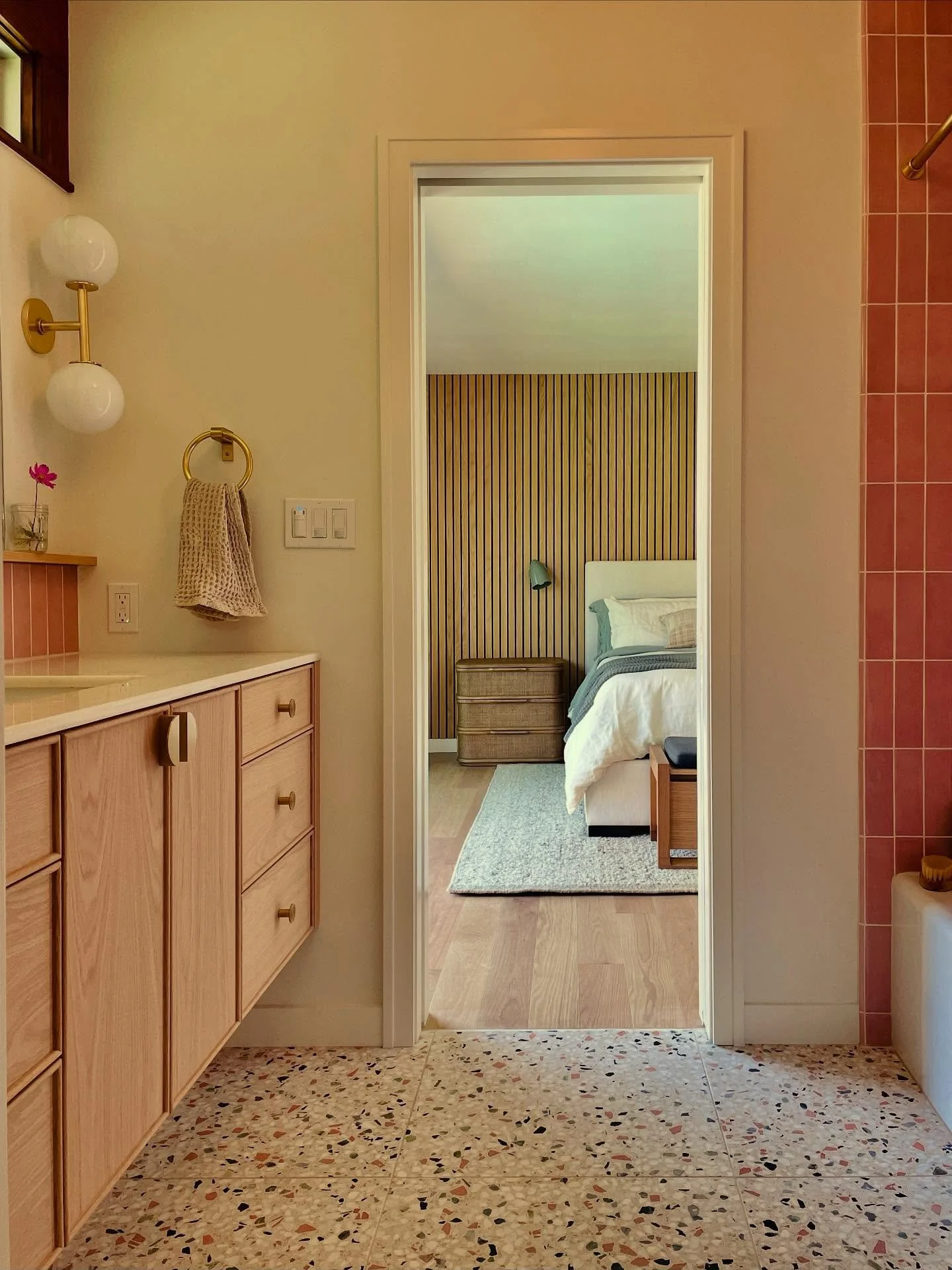 A pink-tiled en-suite for a seven-year-old princess with strong opinions. Oak, warm floors, fun terrazzo underfoot all catching quiet natural light from the clerestory window. 

Design + Build: @kellowconstruction 
Tile: @tilecodist + @concretecollab