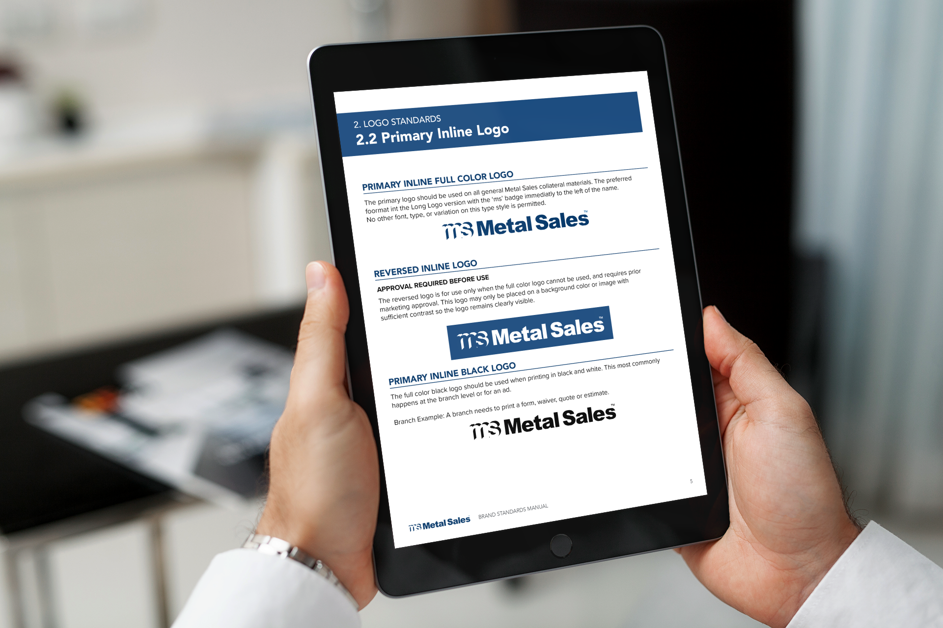 mockup-of-a-man-s-hands-holding-an-ipad-mini-2108-el1.png