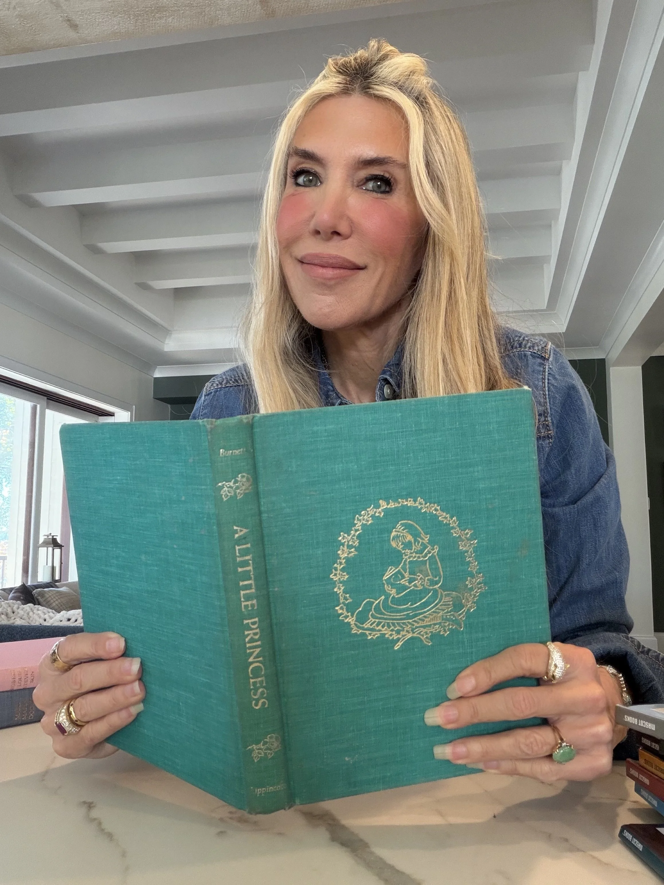 Marnie Schneider reading "A Little Princess" book