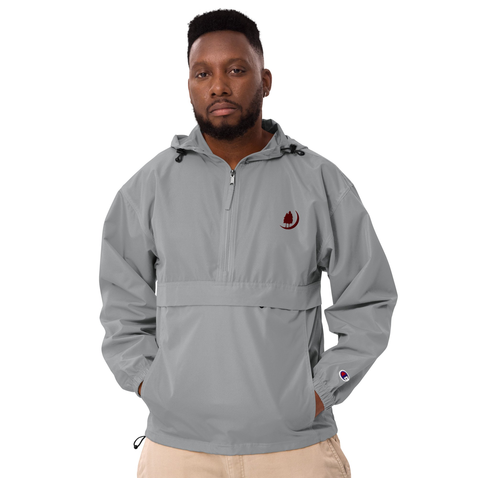 embroidered-champion-packable-jacket-graphite-front-63f4f03f571ae.jpg