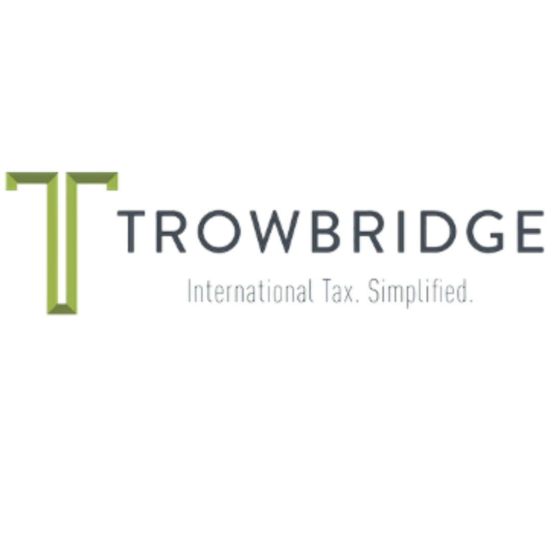 A neon sign reading 'Hombridge' with smaller text below that says 'The Story of a Little Town'.