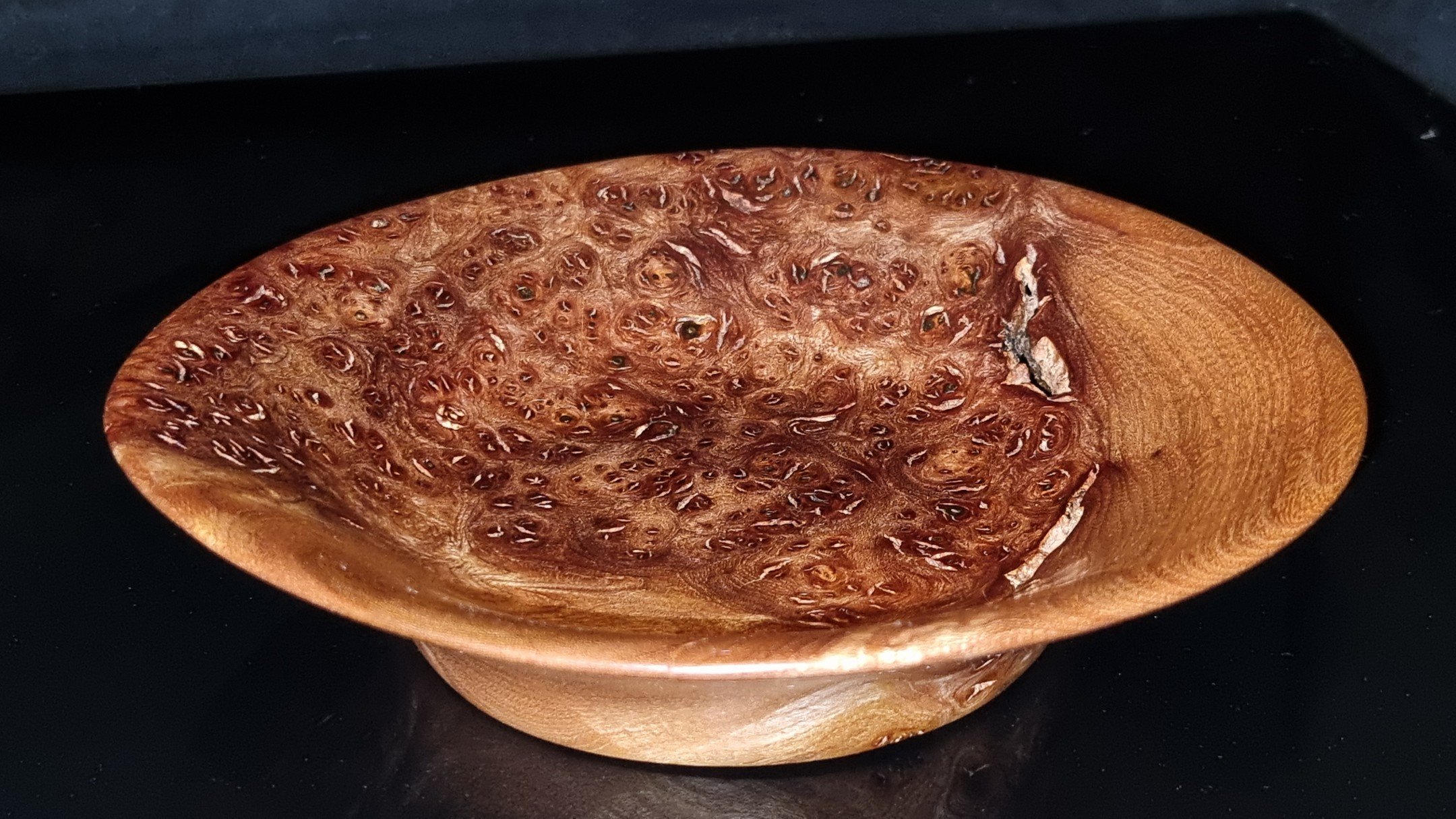 After many months of drying, this wavey elm burl bowl is ready to go... Turned in December 2022 while it was still green, it has sat in my storage slowly drying to give it the wavey edges. Though, probably not the best for any that struggle with tryp