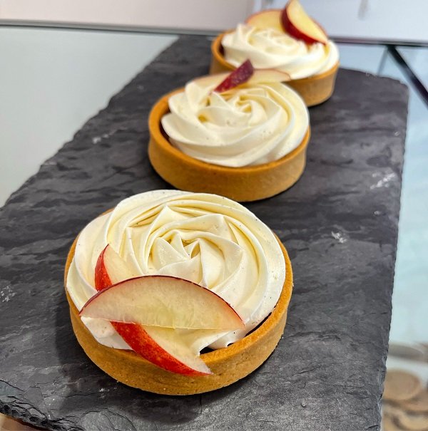 three ganache tarts with apple slices