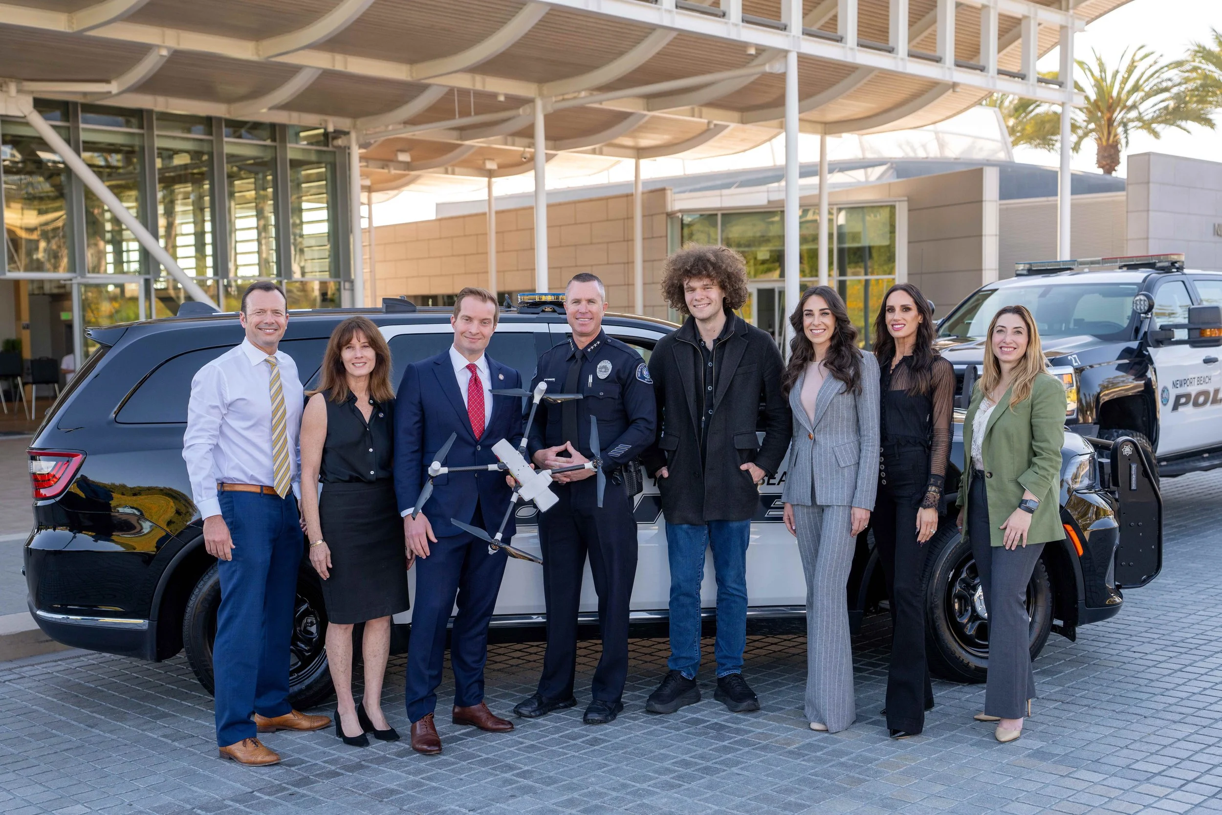 DRONE DEMO GROUP PHOTO COUNCIL PD AND DRONE CO OWNER.jpg
