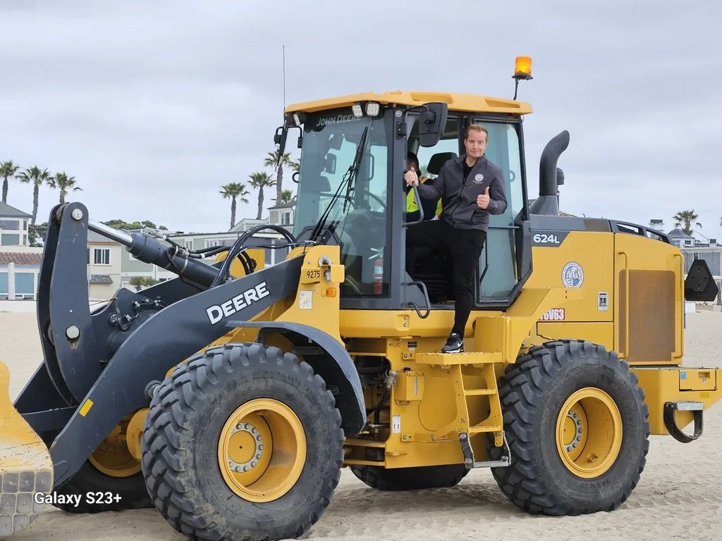 MAYOR JOE STAPLETON ON TRACTOR.jpeg