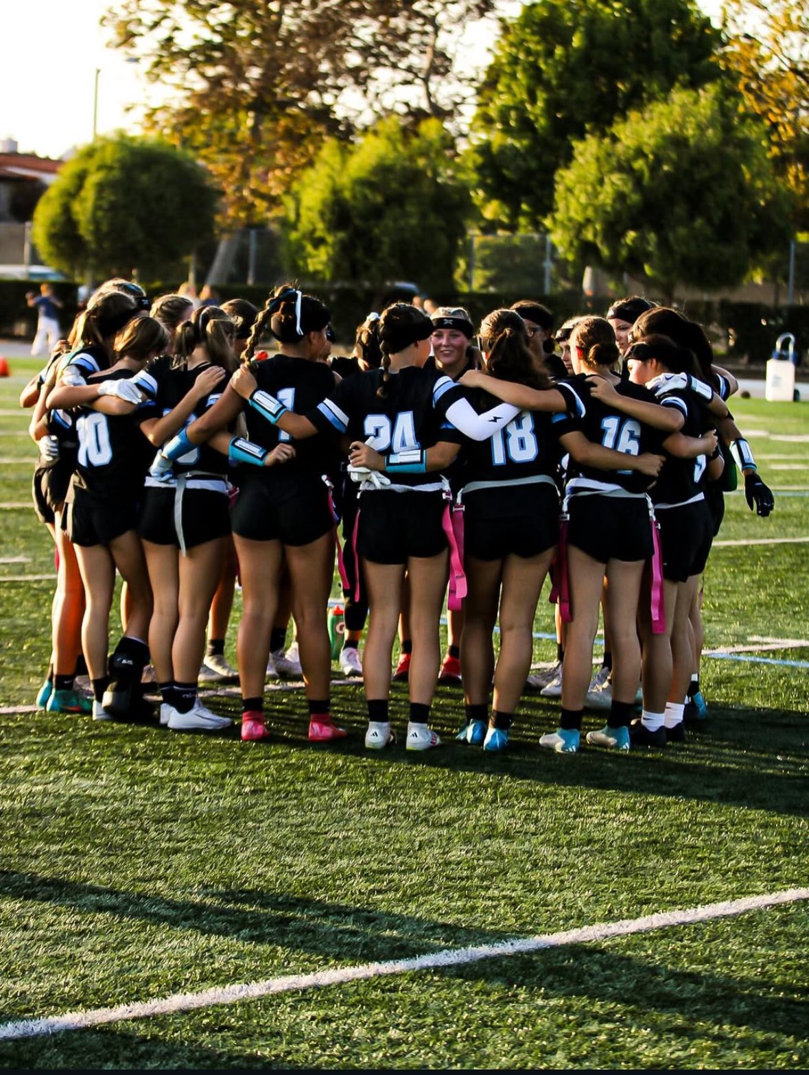 CDM GIRLS FLAG FOOTBALL HUDDLE.JPEG