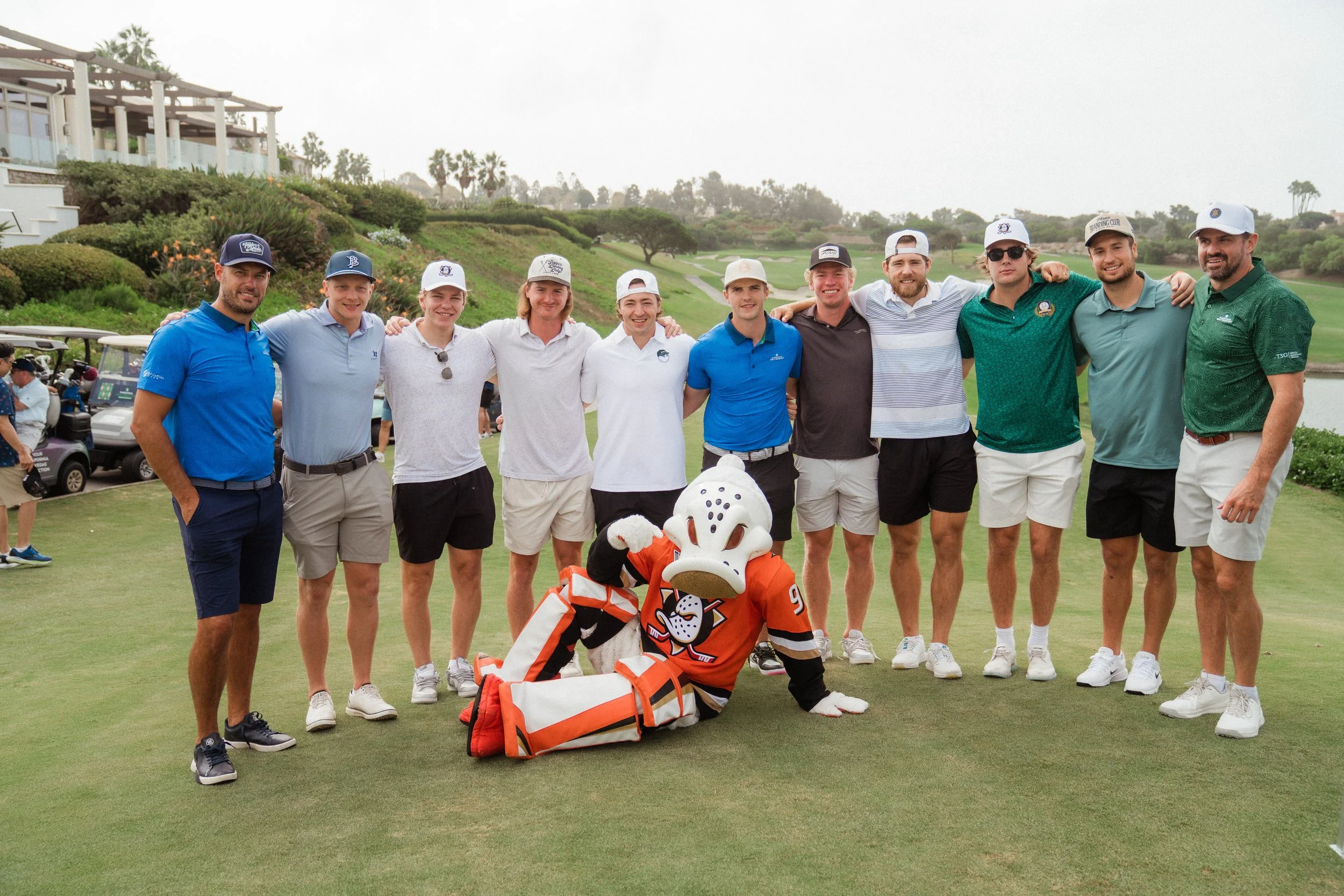 Anaheim Ducks Players with Wild Wing.jpg