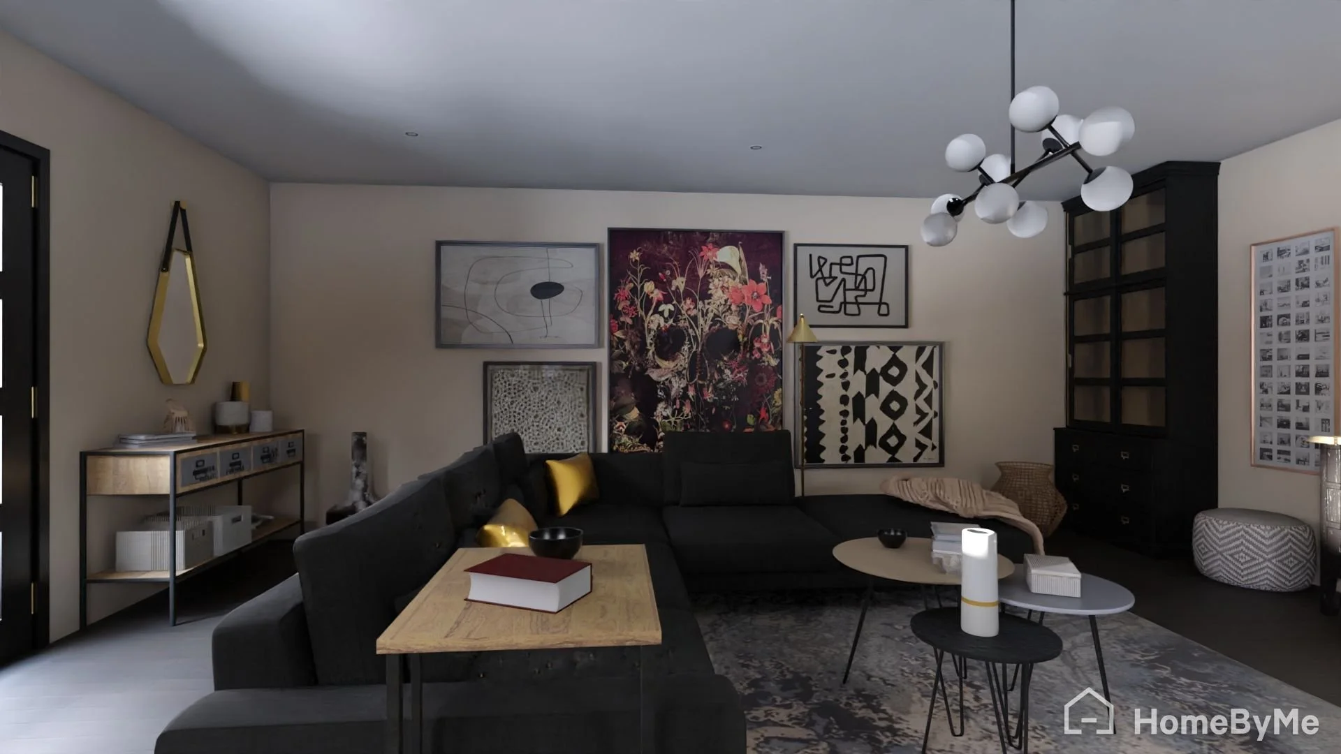 Living room with black sectional sofa, modern art on the wall, and black and gold decor accents. Light-colored walls and a patterned rug under a set of three nested coffee tables.