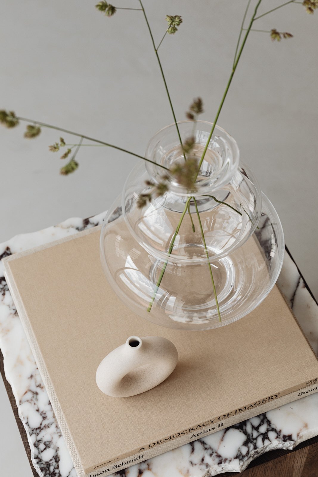 kaboompics_ceramic-glass-vase-side-table-walnut-wood-marble-books-26714.jpg