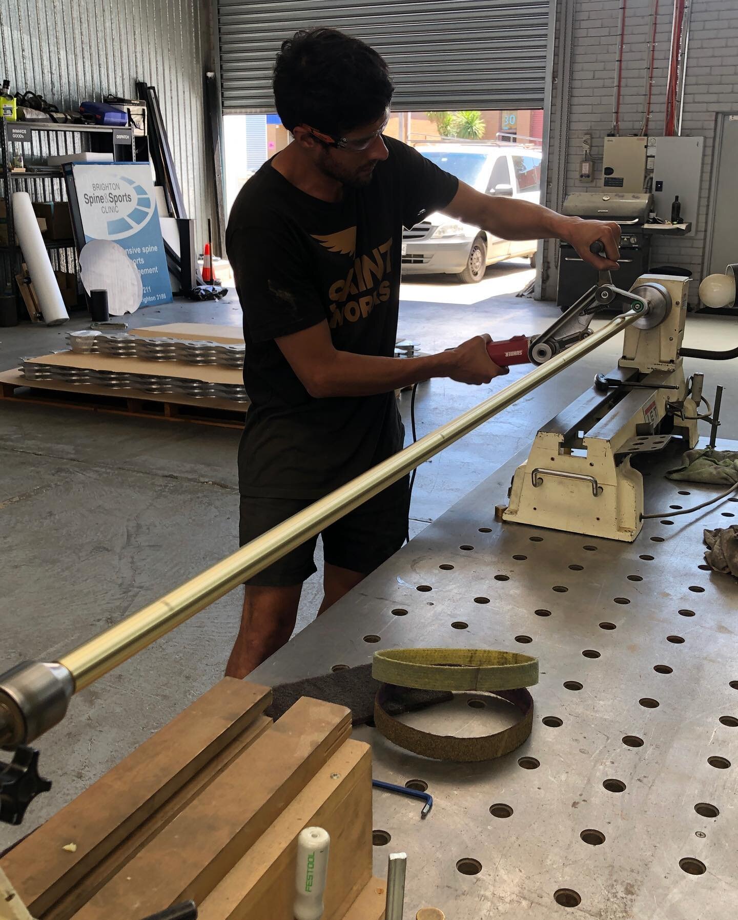 Brass and stainless steel entry handles @the_project_collective #brasshandles . Getting a polish with our suhner tube polisher and legend Fernando  @suhneraustria #brassletters #cnc #multicam #suhnerabrasiveaustralia