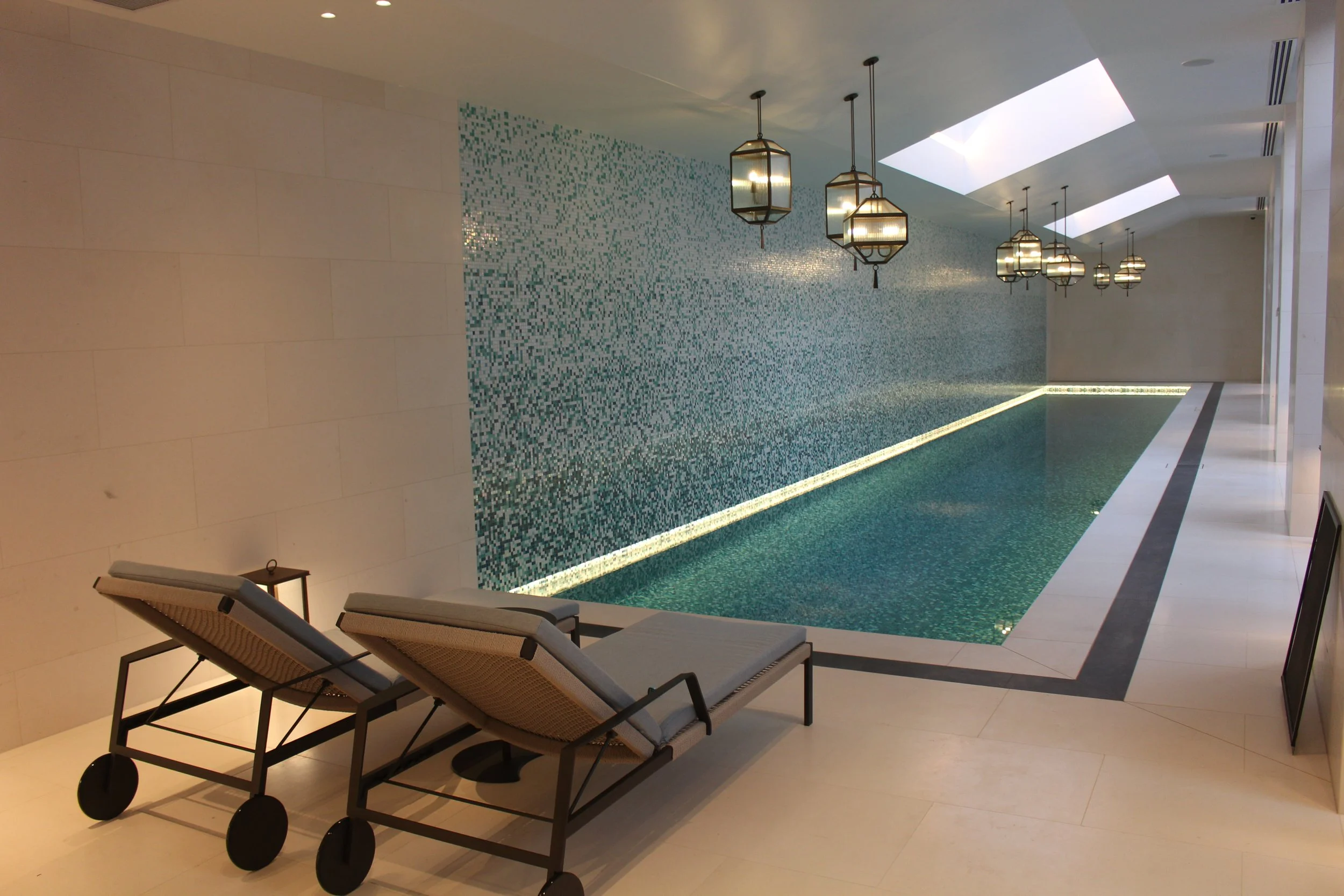 Custom Lighting features above pool