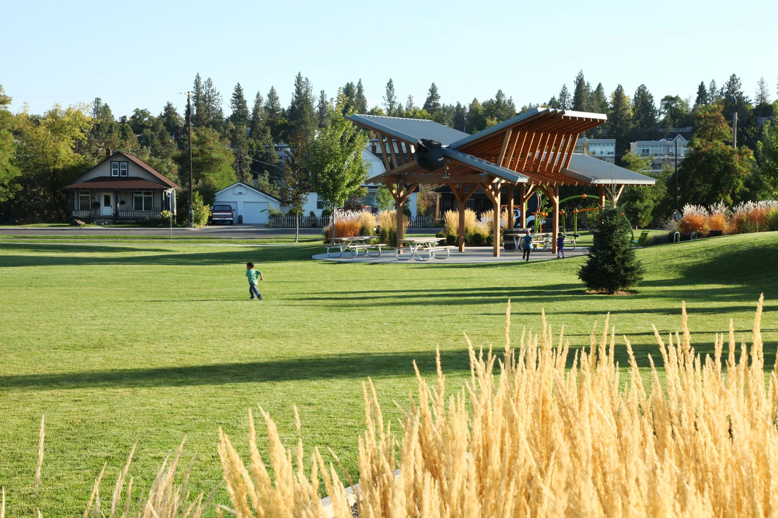 Olmsted Brothers Green_Kid Running in Field.jpg