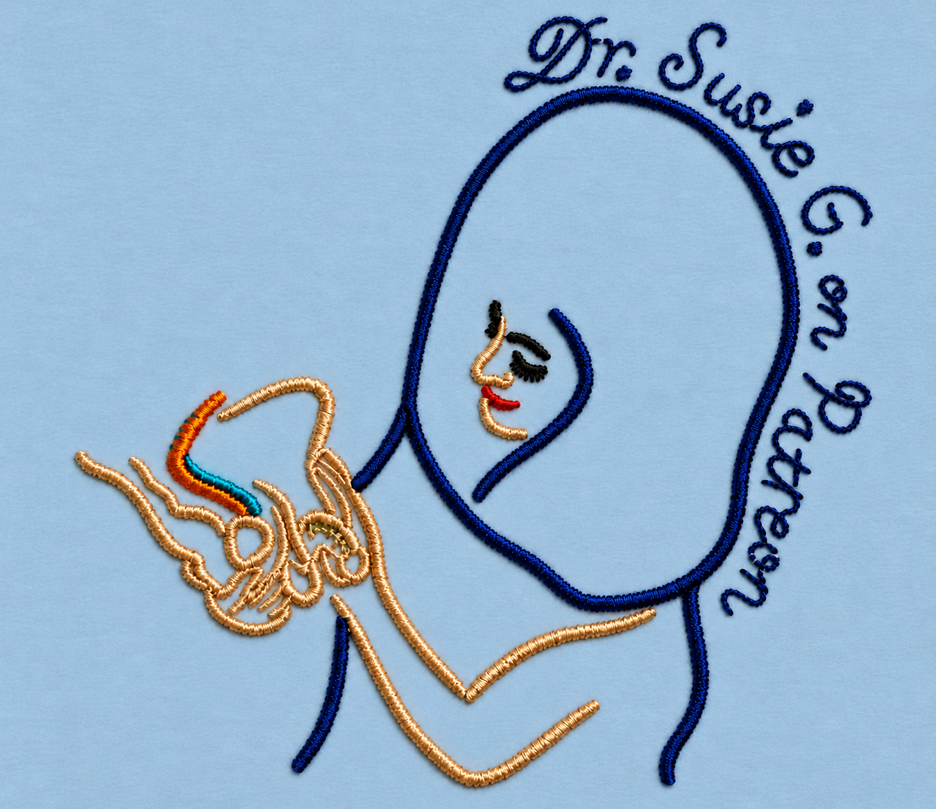 Detailed embroidery on powder blue fabric.png