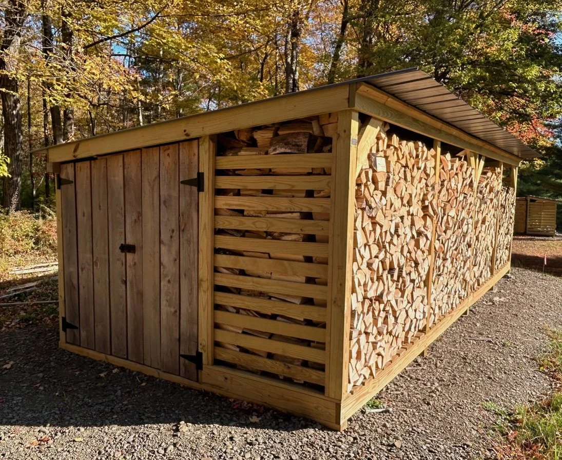 Stacking Wood in a Firewood Shed