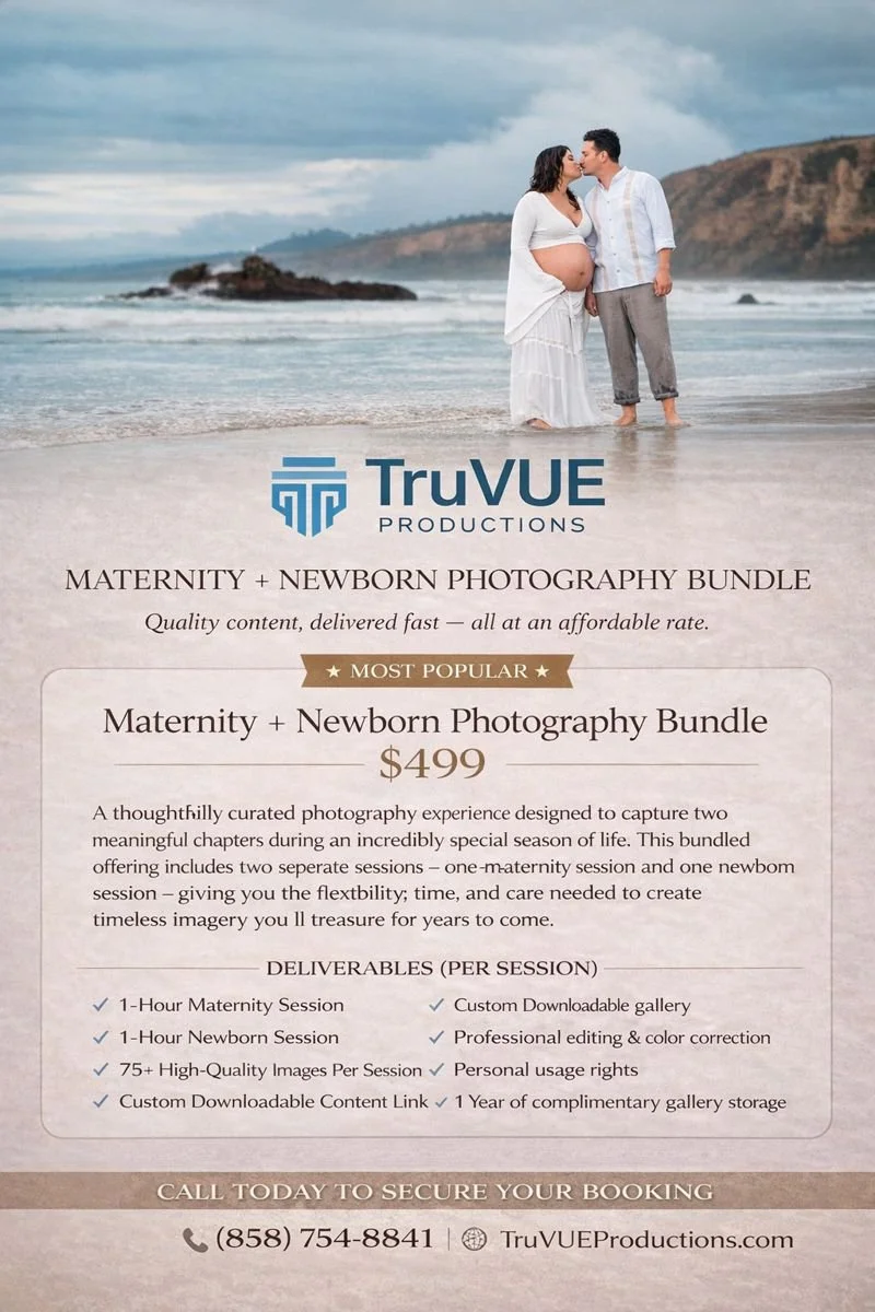 Wedding photo of a pregnant woman and a man standing in the ocean, about to kiss, with rocky islands and cliffs in the background.