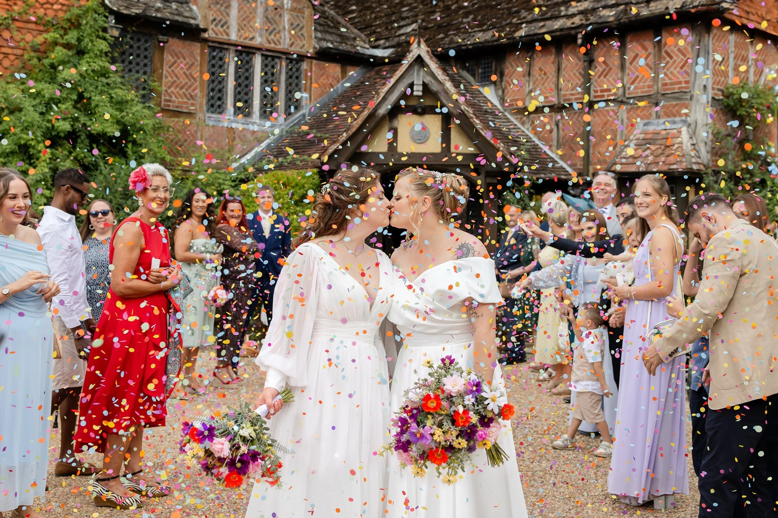 Huge congratulations to the brand new Mrs &amp; Mrs Fenner! What a gorgeous day we had, full of love, laughter and SO much colour!

Elleah &amp; Millie were married at Langshott Manor, a beautiful Tudor manor house set amongst the Surrey countryside,