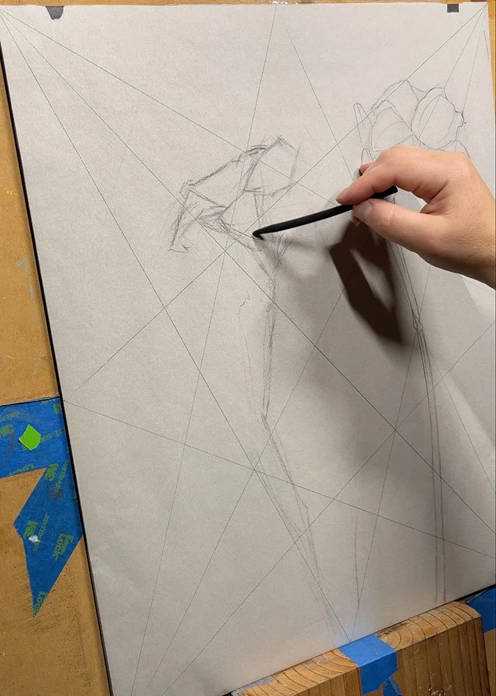 Christine Mercer-Vernon sketches day lilies onto the harmonic armature in preparation of painting.