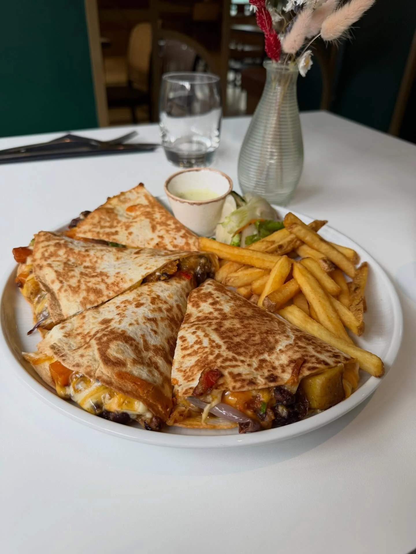Veggie love is real! Our new black bean quesadilla with sweet potatoes, lentils, mozzarella + cheddar, pico de gallo on a flour tortilla with a side of jalape&ntilde;o mayo 🍠🍅🌱