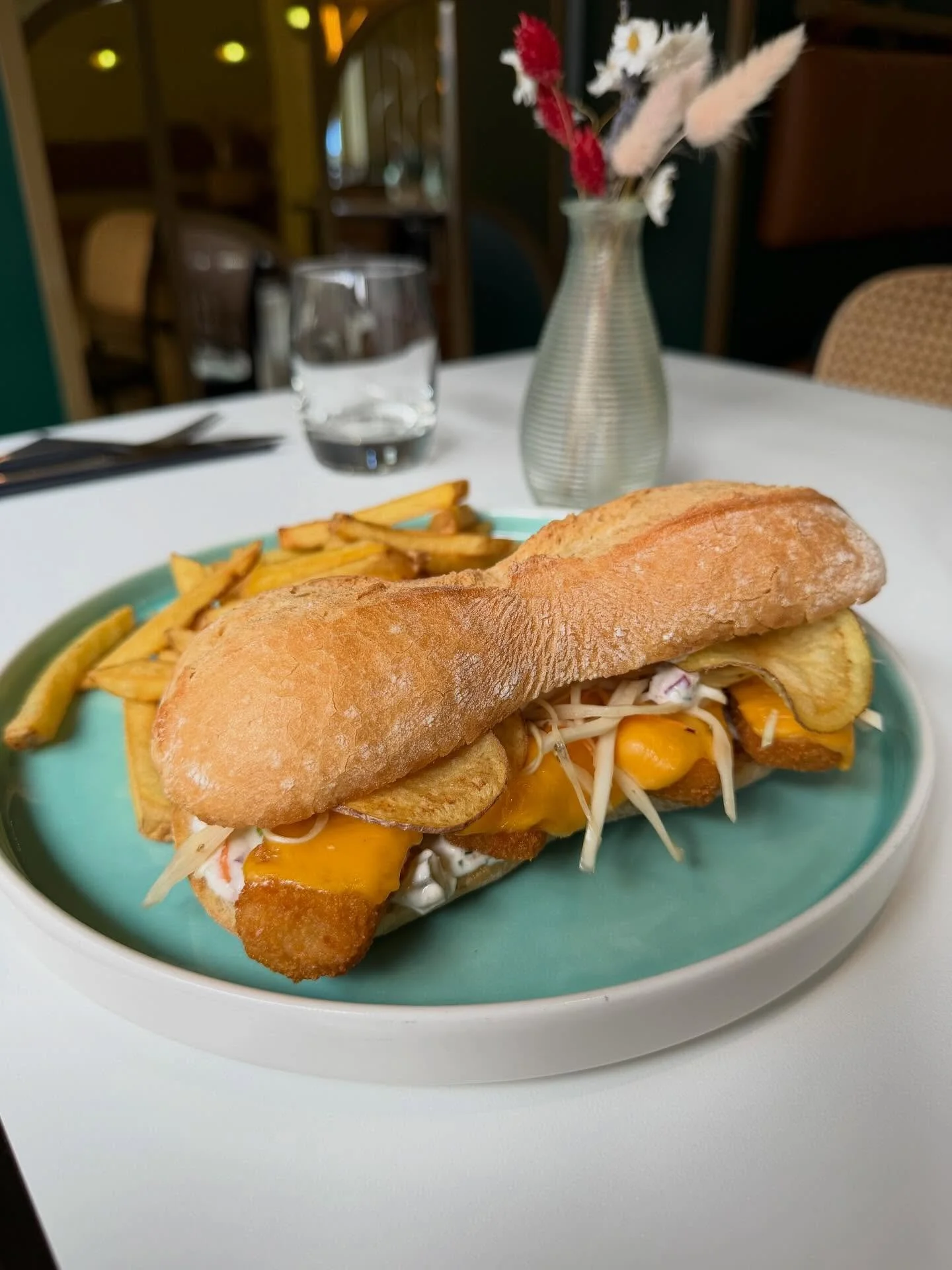 Inspired by all the babies in our lives - a fish finger sandwich with tartare sauce, spicy slaw, american cheese, crisps on ciabatta served with fries 🍟 🐟 🌟