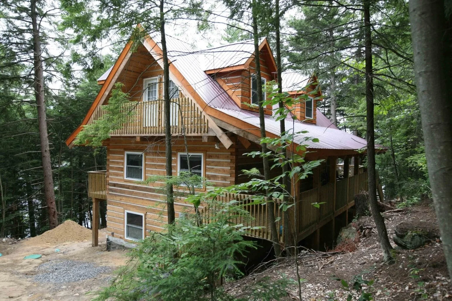 EcoLog walkout 4 dormers, porch, balcony and deck-min.jpg