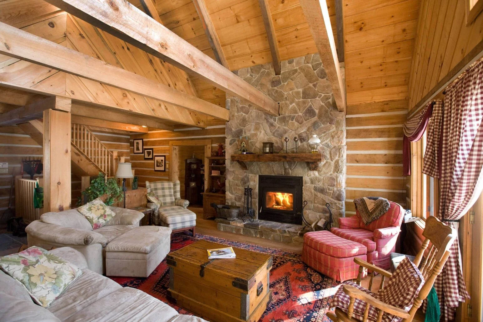 Ecolog interior open loft and stone fireplace-min.jpg
