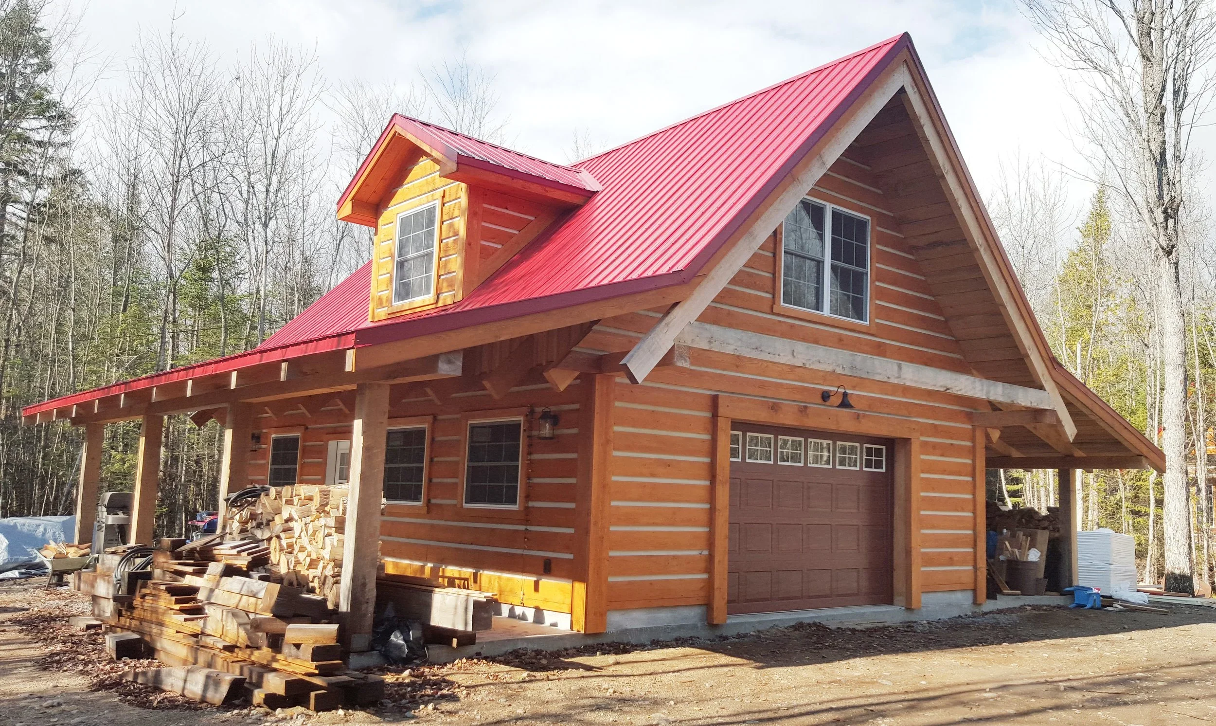 Log House with Garage and Porch.webp