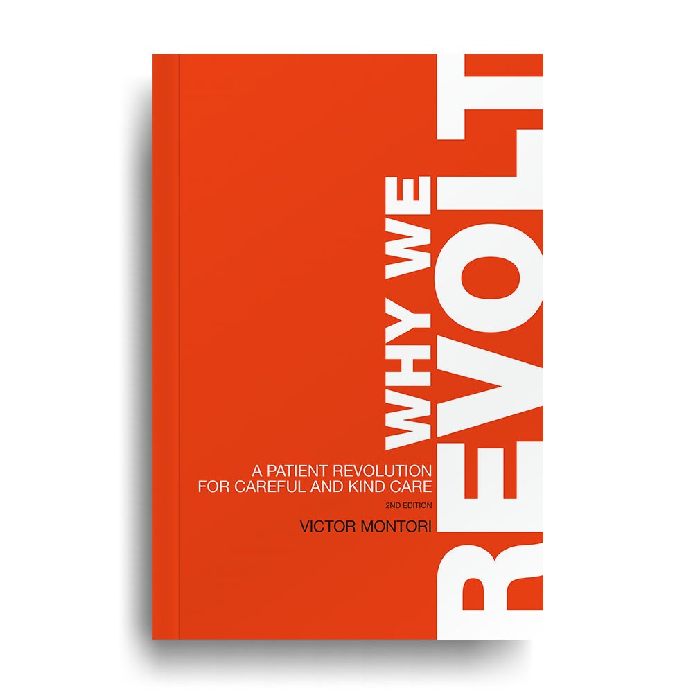 Why We Revolt paperback book on a white background