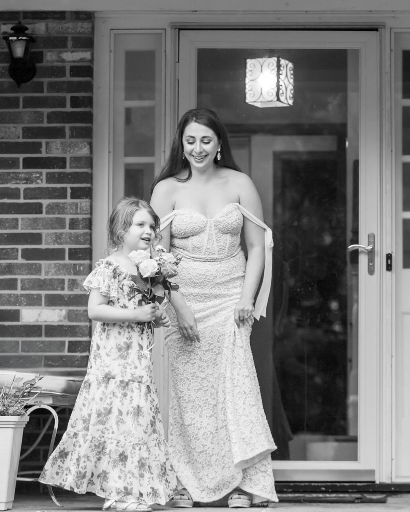 Sometimes you meet a person so beautiful (inside &amp; out) and it&rsquo;s such a joy to capture them.  Here is Cait with all of her favorite kiddos in black 🖤 &amp; white 🤍 from her wedding day.  I couldn&rsquo;t love these photographs more! ✨✨✨

