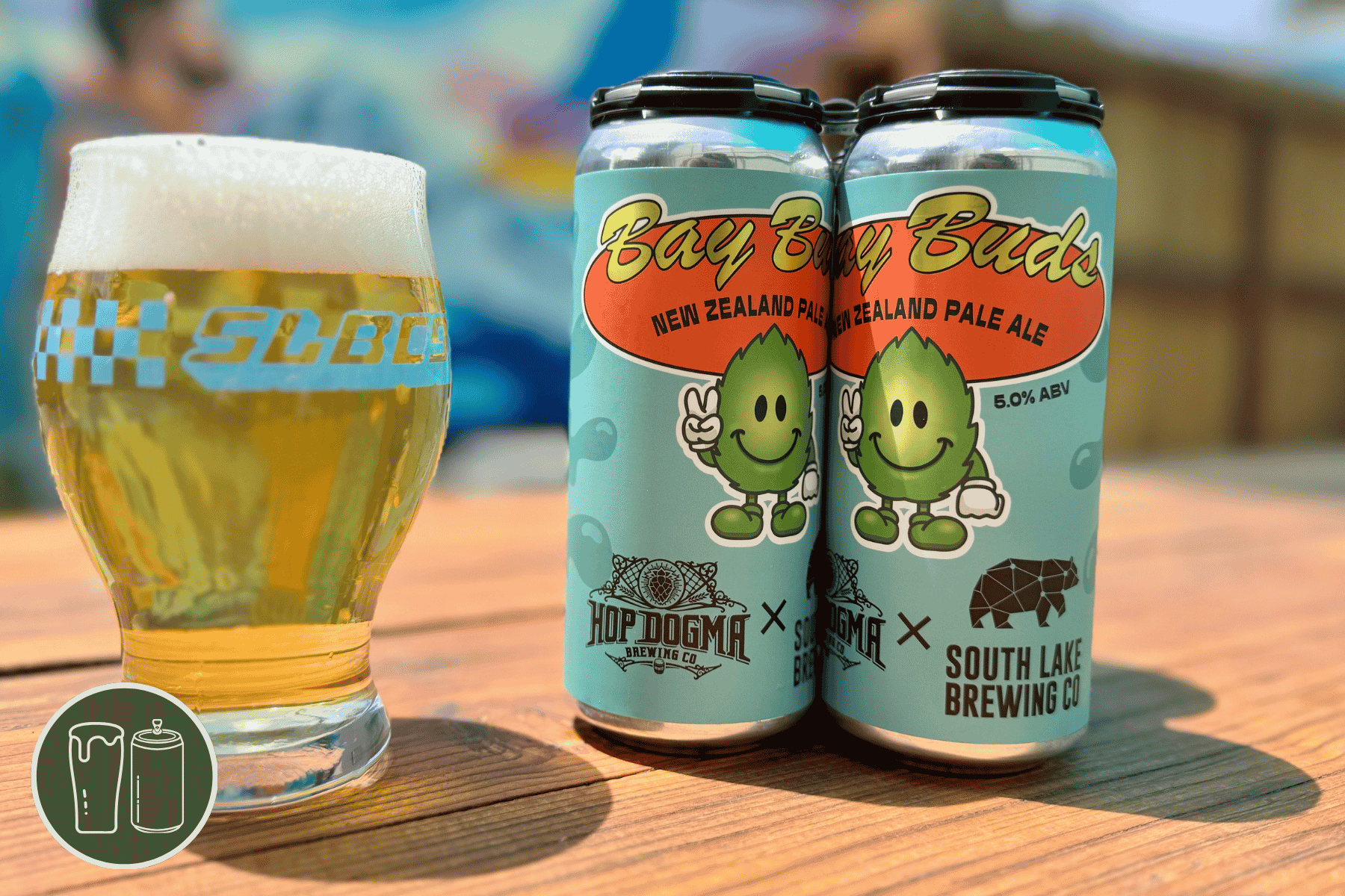 Four Pack of Bay Buds next to a 9th anniversary pint glass